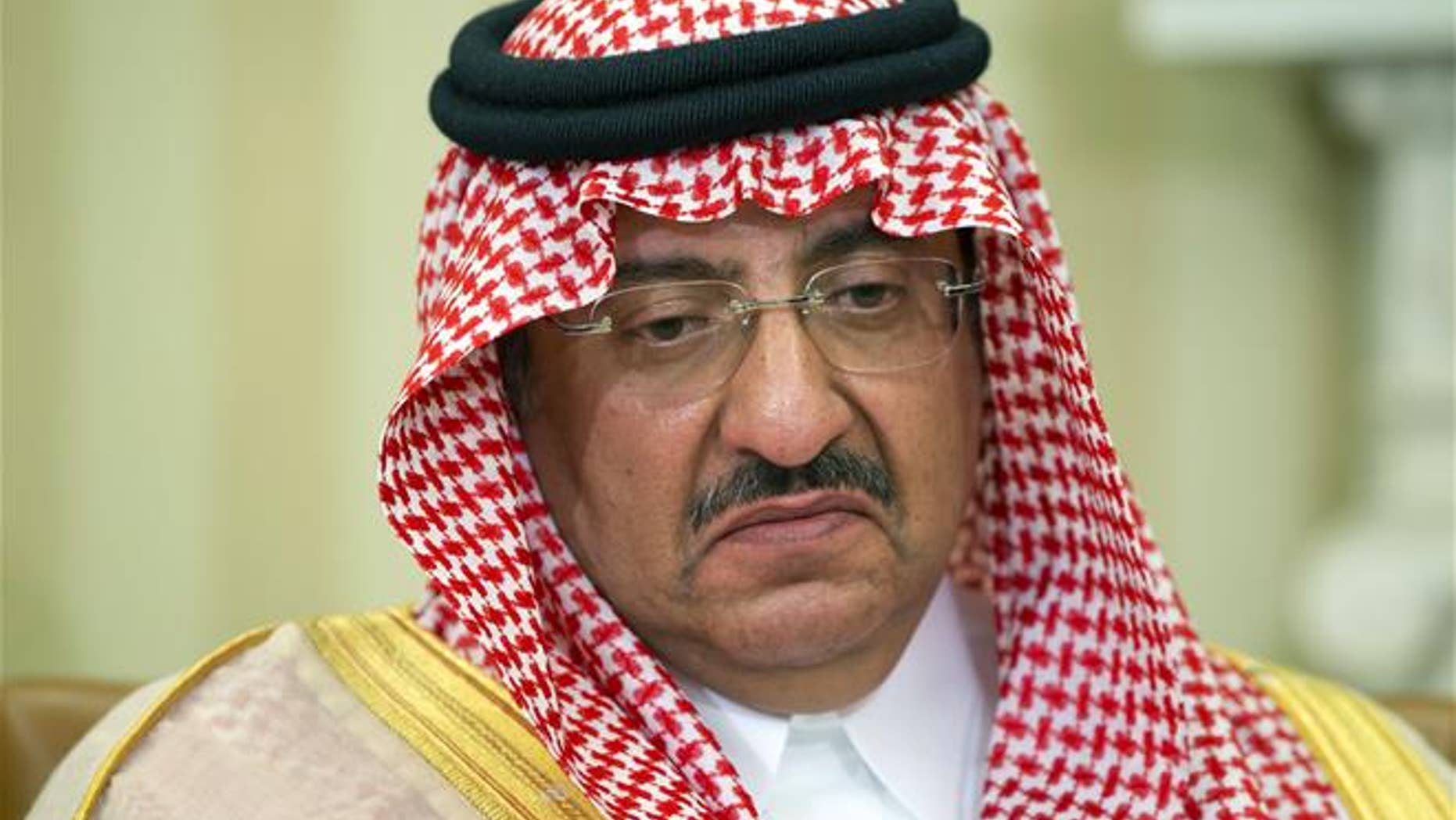 In this May 13, 2015, file photo, Saudi Arabian Crown Prince Mohammed bin Nayef pauses while speaking during a meeting with President Barack Obama in the Oval Office of the White House.