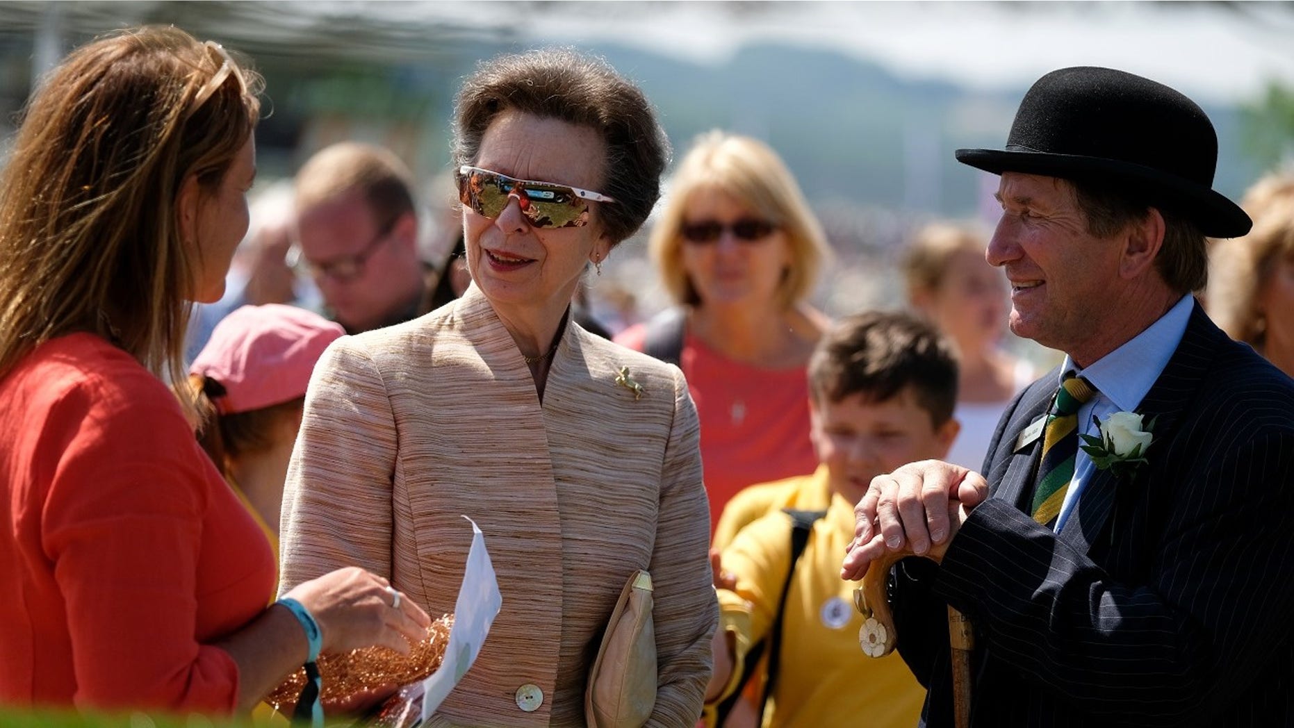 HRH Princess Anne, Princess Royal speaks with Emma Stothard (L) about her sculpture Craven Heifer as she visits during the second day of the 160th Great Yorkshire Show on July 11, 2018 in Harrogate, England.