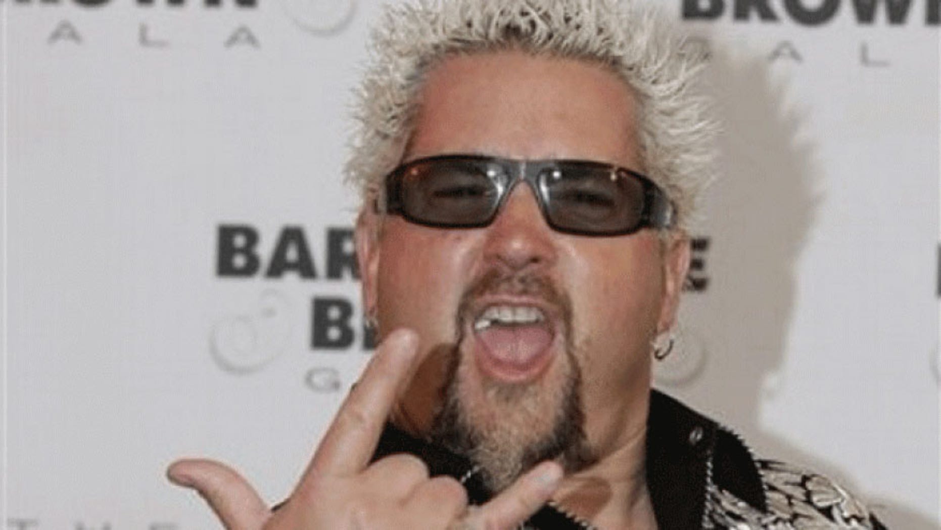 Guy Fieri's tailgate will come complete with a steak sandwich station, whole hog, a mac and cheese bar, nacho bar and more.