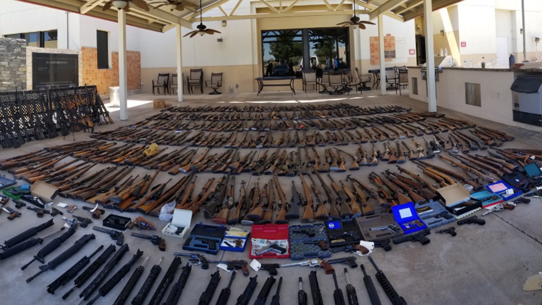 Authorities have seized more than 550 guns at two Southern California homes