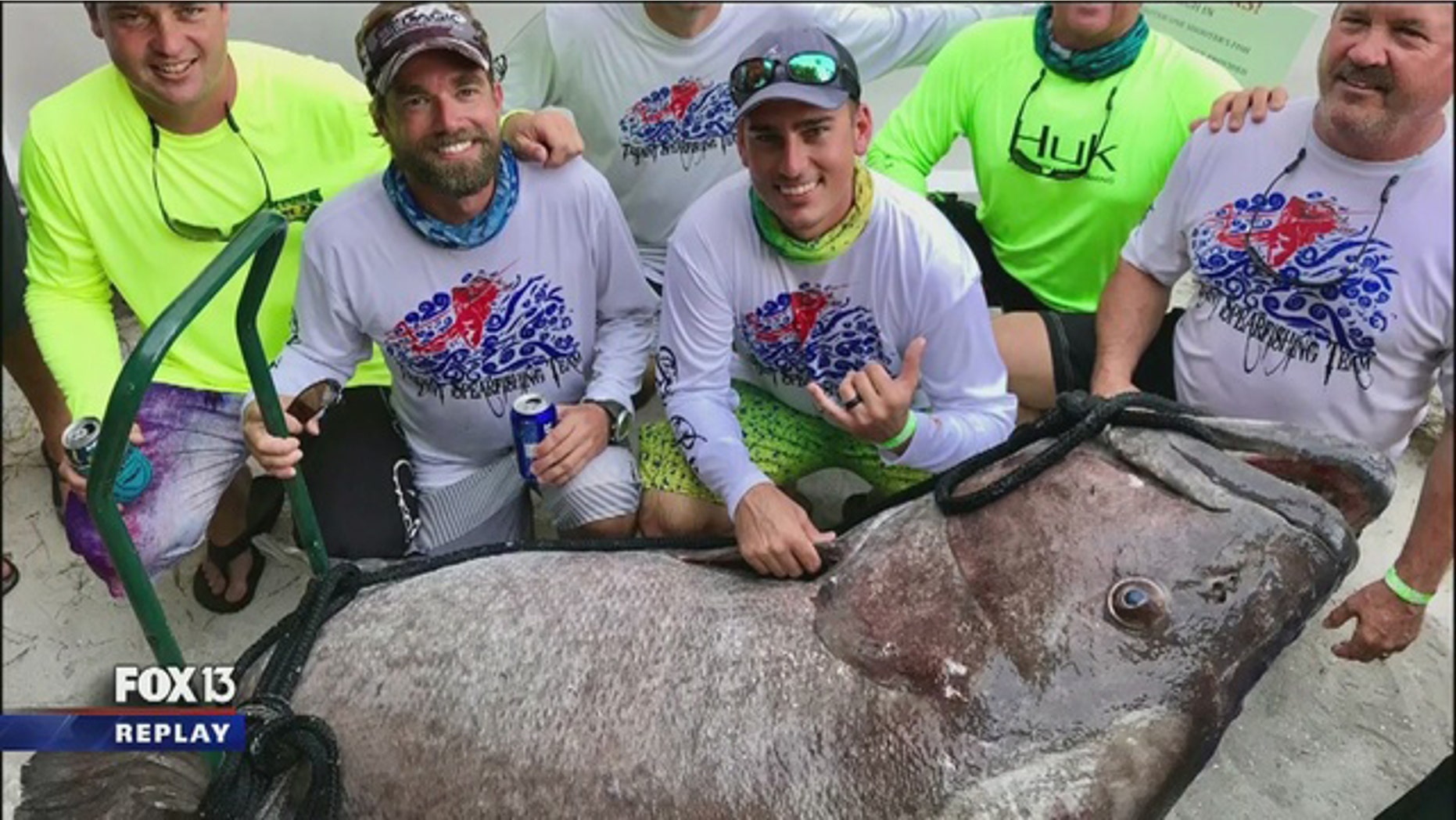 James Taylor and friends pose with the 409-pound Warsaw grouper he caught over the weekend.