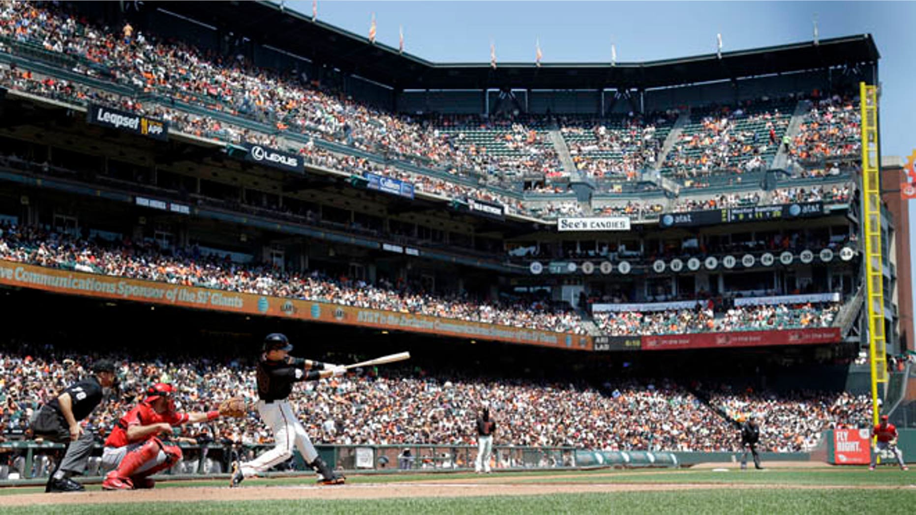 May 2, 2015: San Francisco Giants' Buster Posey hits a double against the Los Angeles Angels in San Francisco.