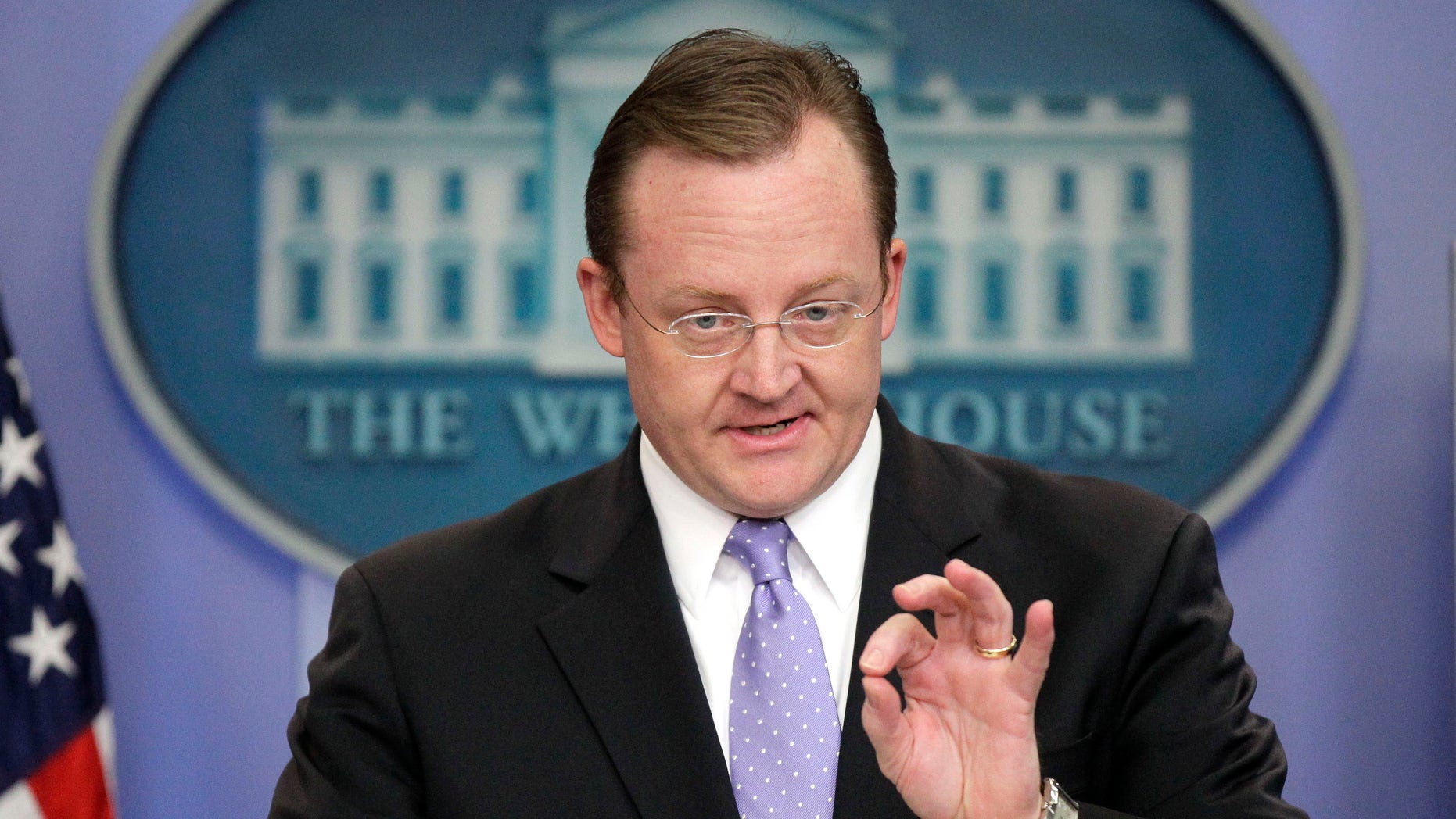 Dec. 13: White House Press Secretary Robert Gibbs gestures during his daily news briefing at the White House.