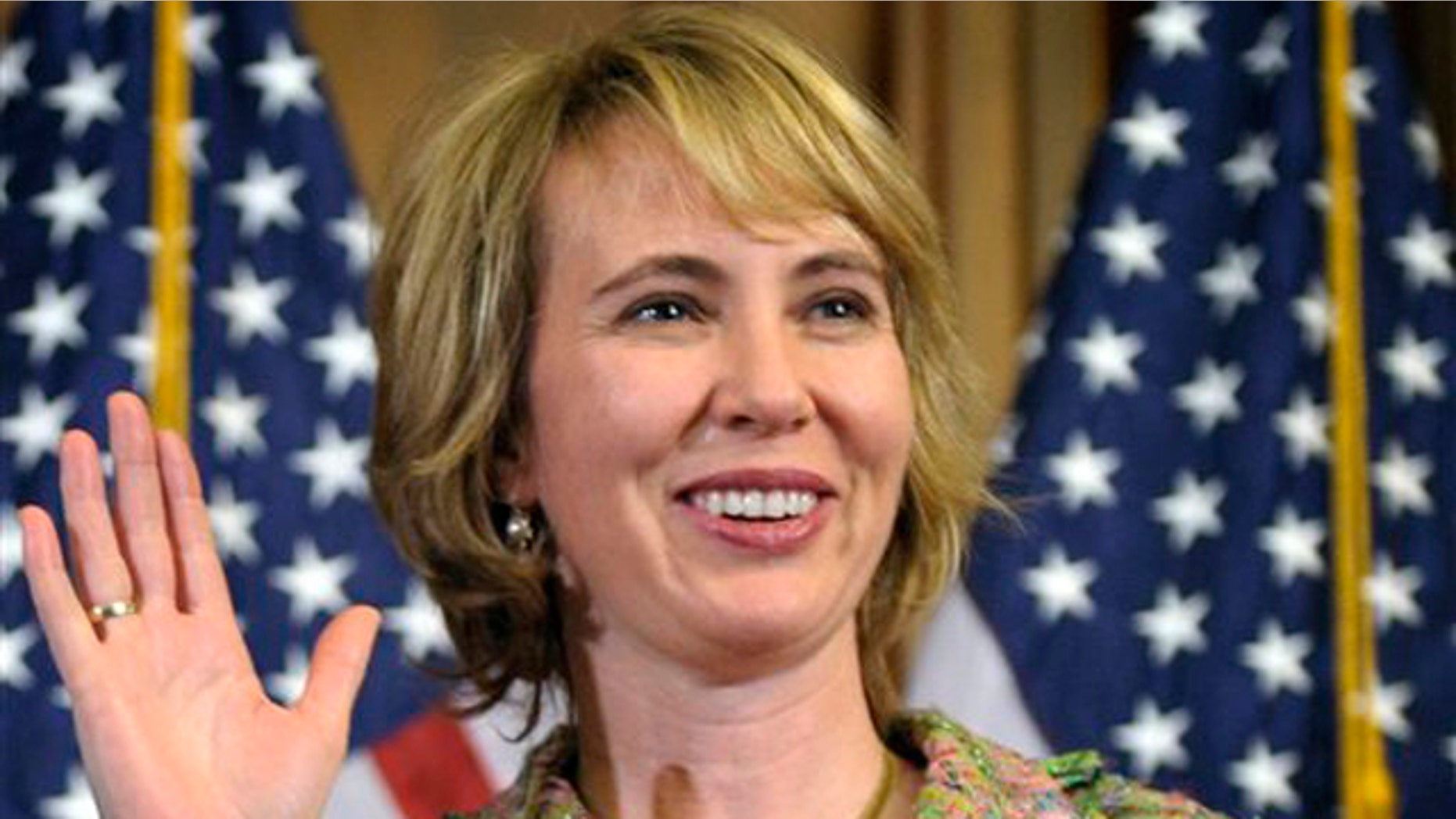 In this Jan. 5 file photo, Rep. Gabrielle Giffords takes part in a reenactment of her swearing-in on Capitol Hill.