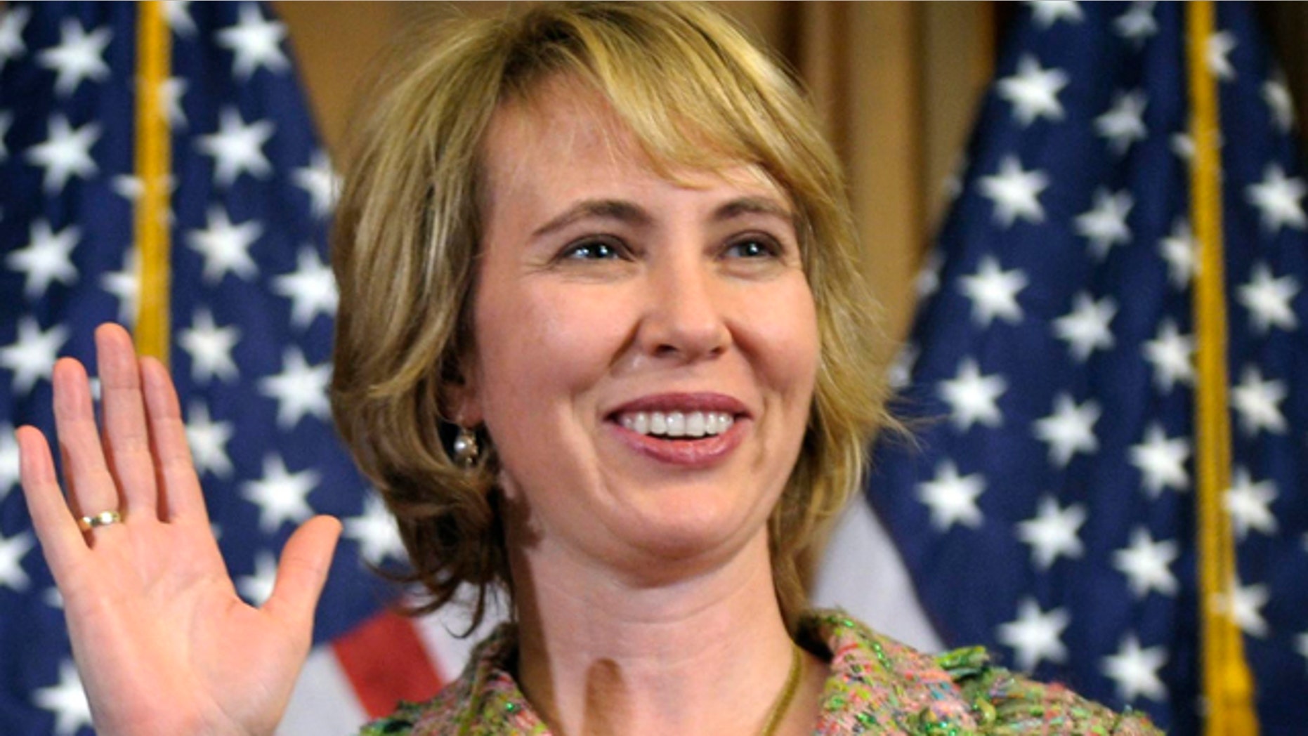 A Jan. 5, 2011 file photo shows Rep. Gabrielle Giffords, D-Ariz., taking part in a reenactment of her swearing-in on Capitol Hill in Washington.