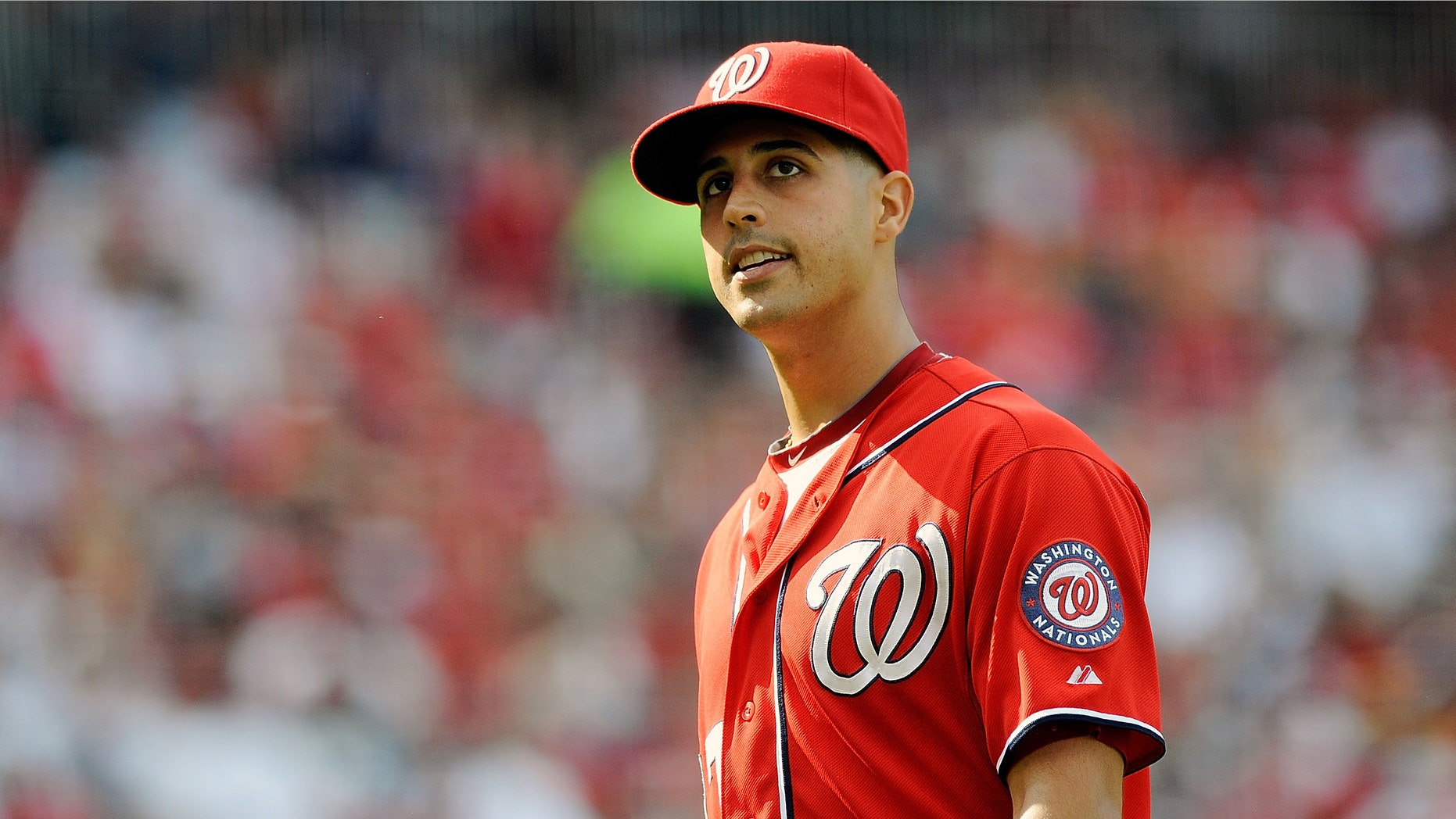 WASHINGTON, DC - SEPTEMBER 22: Gio Gonzalez #47 of the Washington Nationals walks off the field during a game against the Milwaukee Brewers at Nationals Park on September 22, 2012 in Washington, DC. Gonzalez won his 20th game of the season as the Washington Nationals defeated the Milwaukee Brewers 10-4. (Photo by Patrick McDermott/Getty Images)