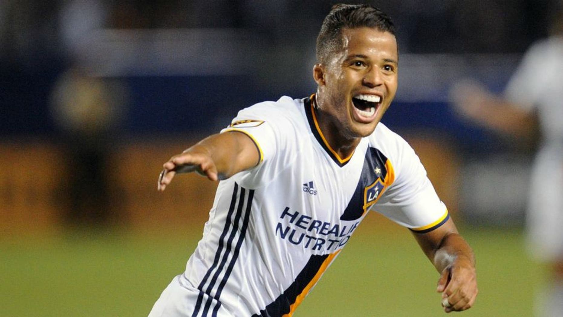 April 23, 2016; Carson, CA, USA; Los Angeles Galaxy forward Giovani dos Santos (10) celebrates his goal scored against Real Salt Lake during the first half at StubHub Center. Mandatory Credit: Gary A. Vasquez-USA TODAY Sports