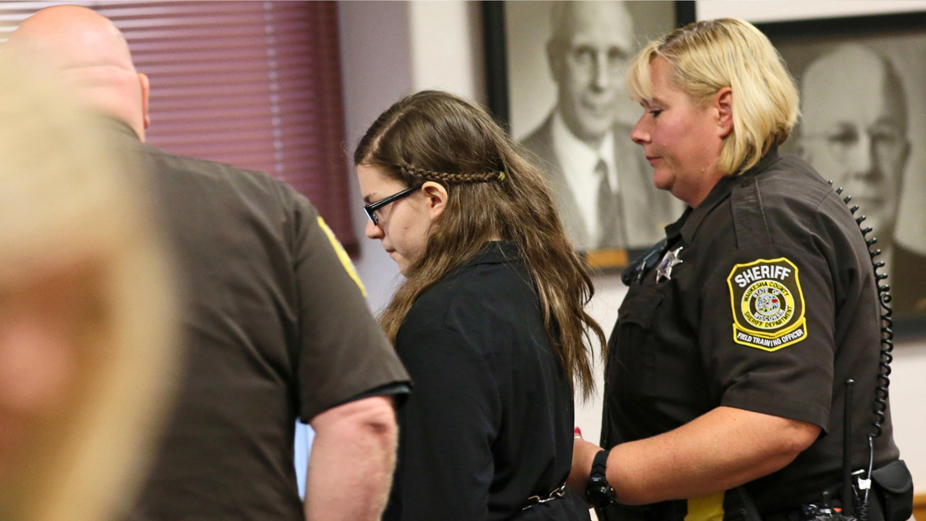 Sept. 9, 2016: Anissa Weier, accused of trying to kill a classmate to please horror character Slender Man, is led out of Waukesha County Circuit Court in Waukesha, Wis.