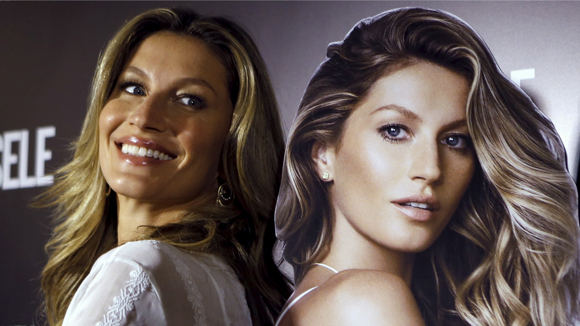 November 6, 2015. Brazilian supermodel Gisele Bundchen poses during the launch of a book that celebrates her 20-year career, in Sao Paulo, Brazil.