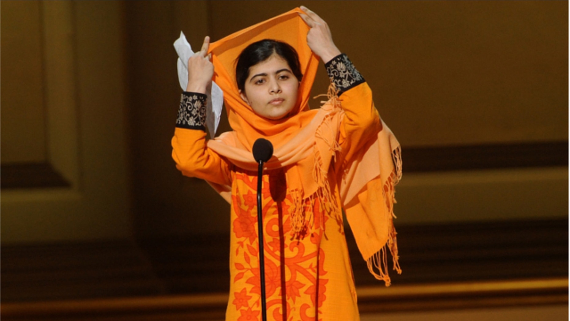 Nov. 11, 2013: Education activist Malala Yousafzai accepts The Women of the Year Fund Honoree Award on stage at the 2013 Glamour Women of the Year Awards in New York.
