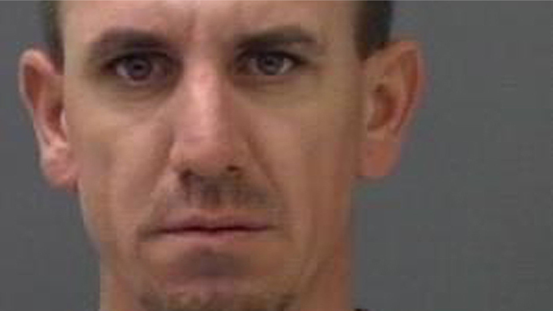 Jonathan Wayne Glass, 36, of Milton, Fla., was charged with cruelty toward a child with great bodily harm and other crimes in the alleged meth lab. (Santa Rosa County Sheriff's Office)