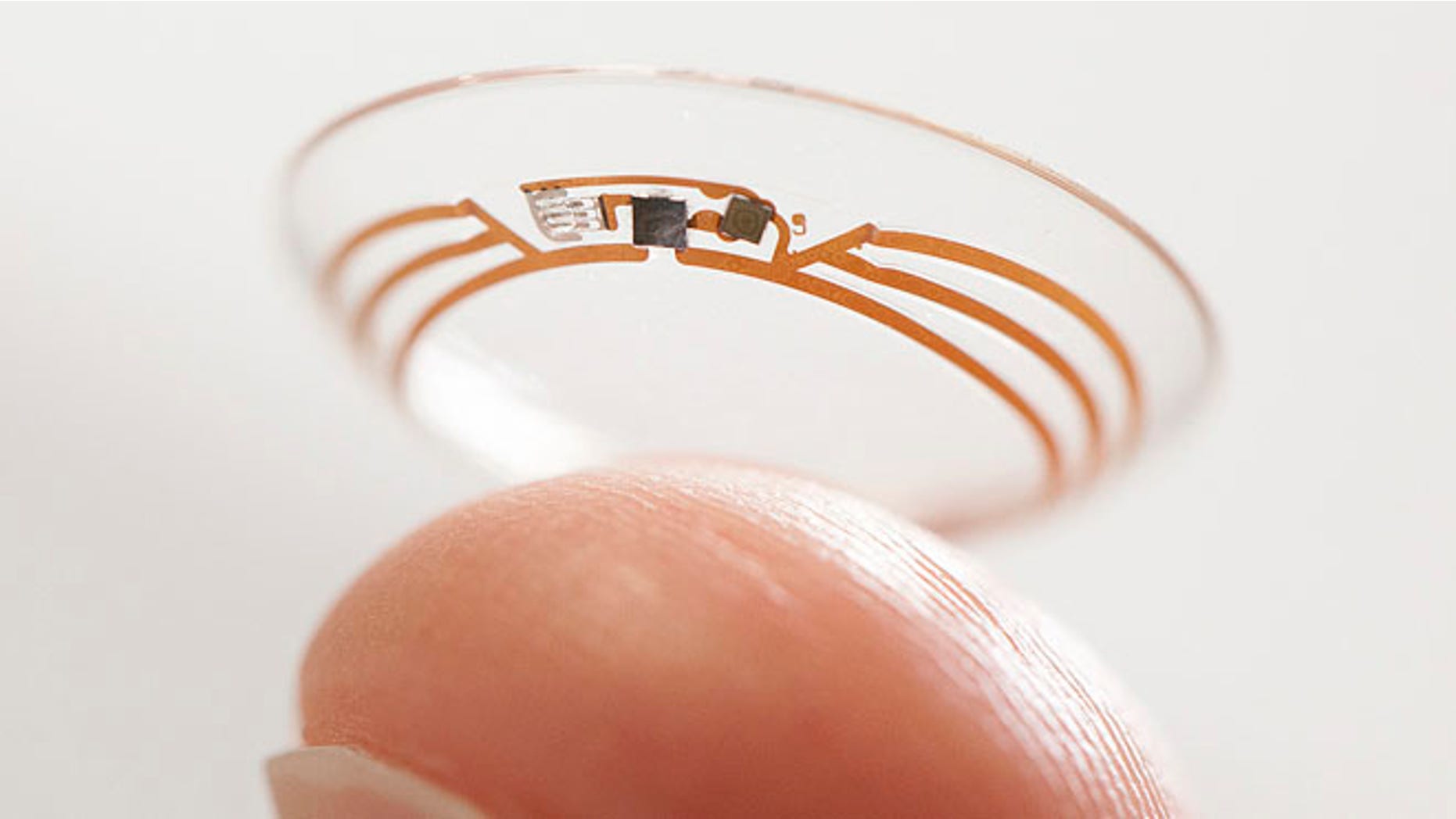 This undated photo released by Google shows a contact lens Google is testing to explore tear glucose.