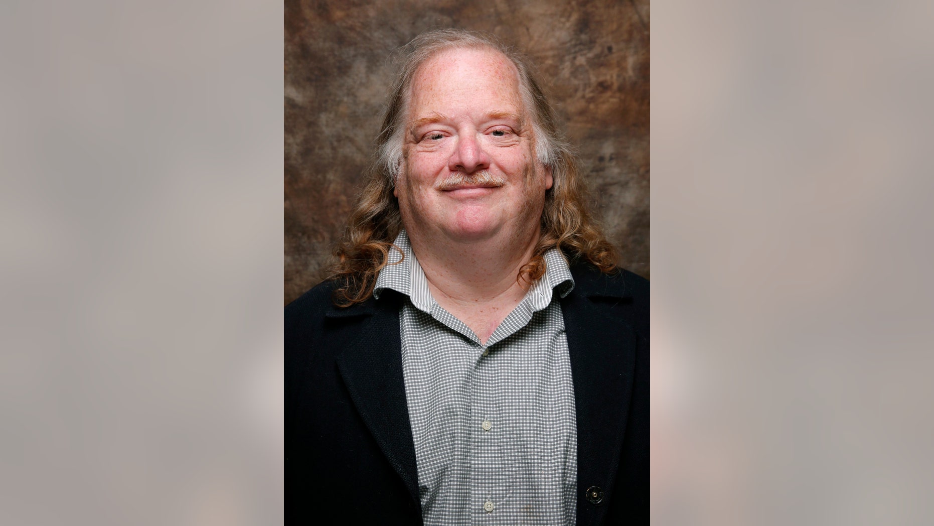Jonathan Gold, from the movie " CITY OF GOLD" poses at the L.A. Times photo & video studio at the Sundance Film Festival, in Park City, Utah in 2015.