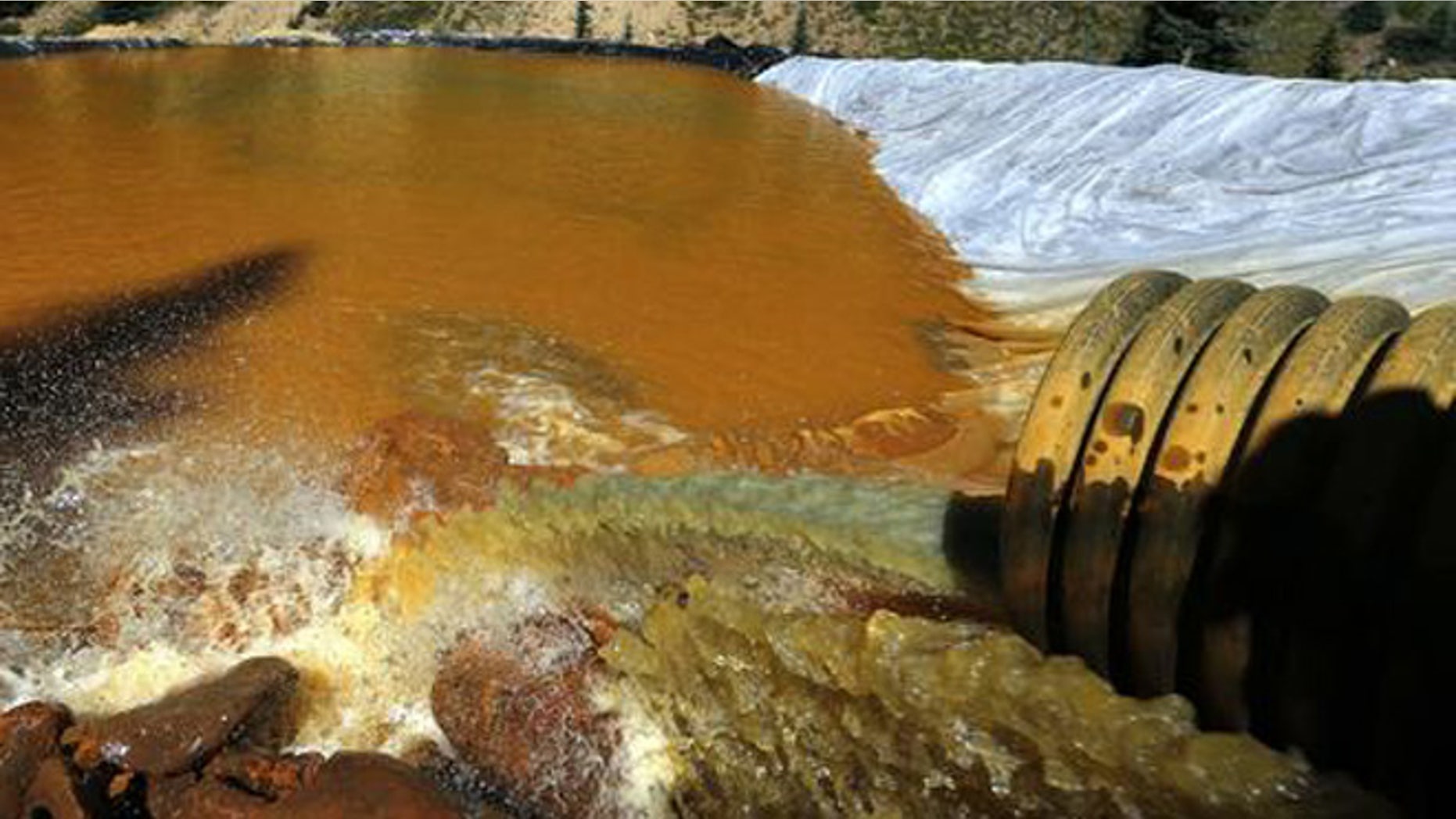 Aug. 14, 2015: Water flows through a series of retention ponds from the Gold King mine chemical spill.