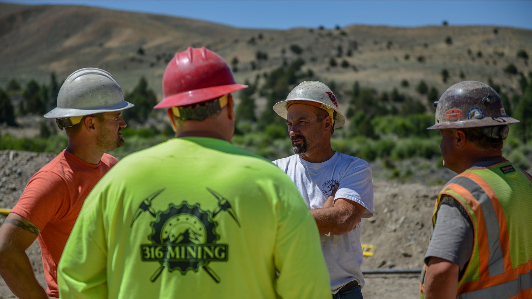 Todd Hoffman, Dave Turin and Freddie Dodge chatting.