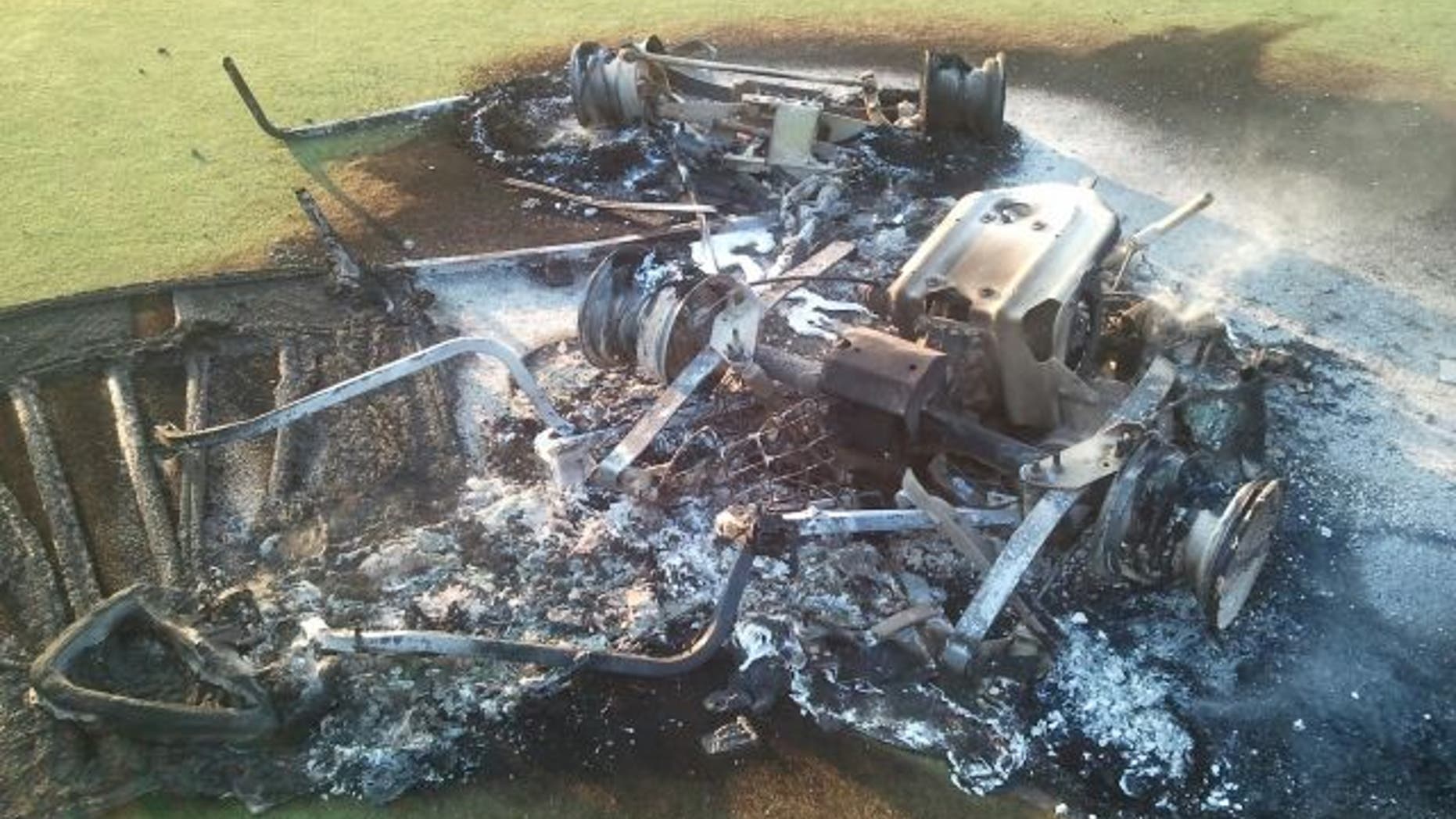 This undated photo shows a damaged golf cart.