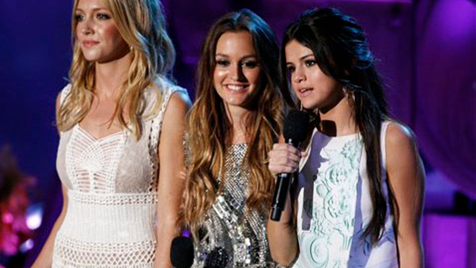 From left to right: Katie Cassidy, Leighton Meester, and Selena Gomez at the MTV Movie Awards.