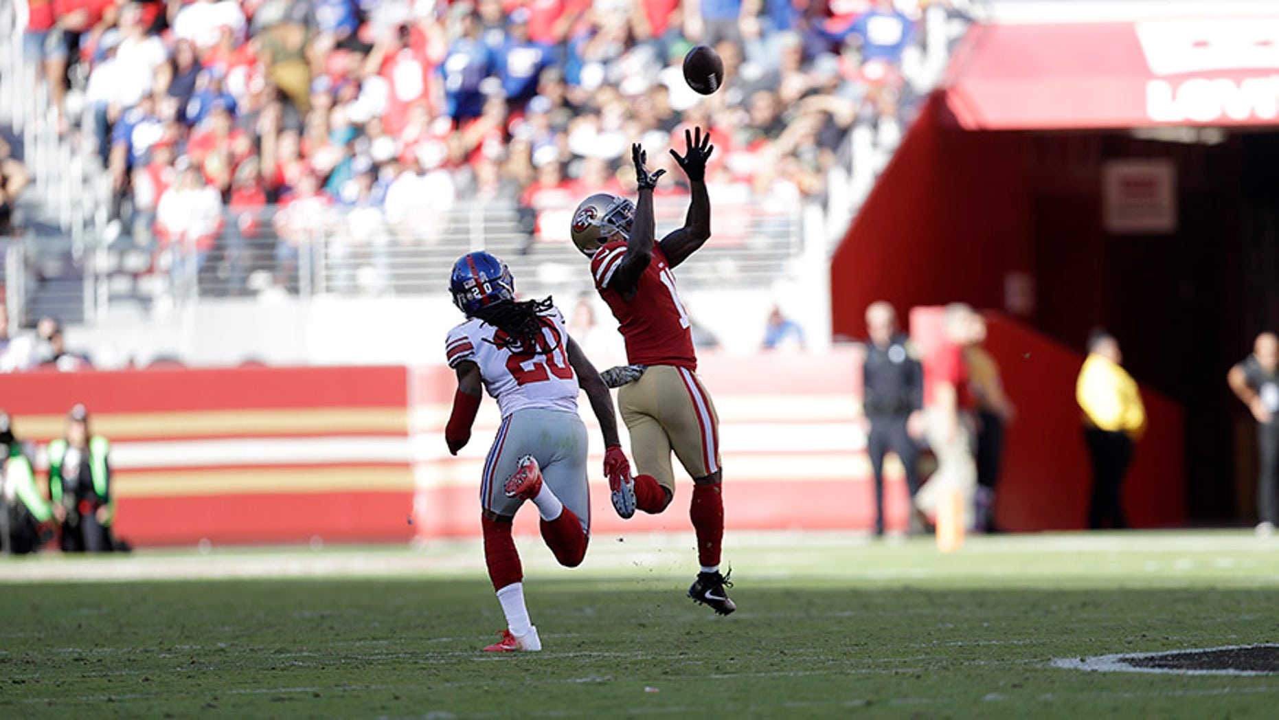 Nov. 12, 2017: San Francisco 49ers wide receiver Marquise Goodwin catches a touchdown pass in front of New York Giants cornerback Janoris Jenkins during the first half of a game in Santa Clara, Calif.,
