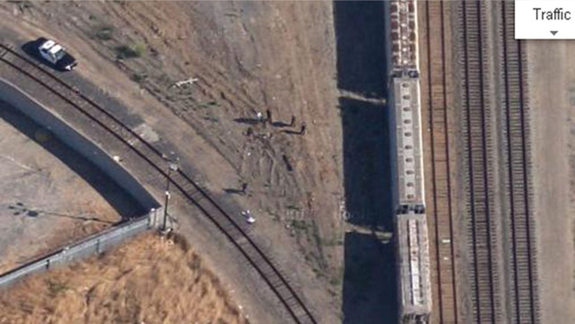 This photo from Google Maps shows investigators surrounding the body of 14-year-old Kevin Barrera in 2009 (Google Maps)
