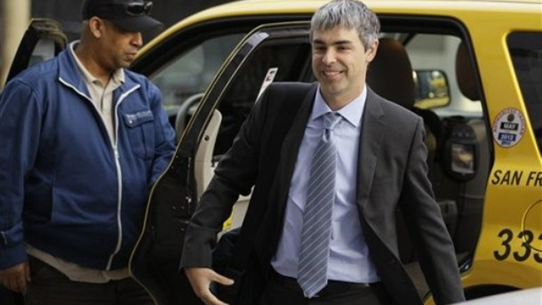 Google CEO Larry Page walks into a federal building in San Francisco, Wednesday, April 18, 2012. A federal jury ruled Wednesday that Google didn't infringe on Oracle's patents during the development of its popular Android platform.