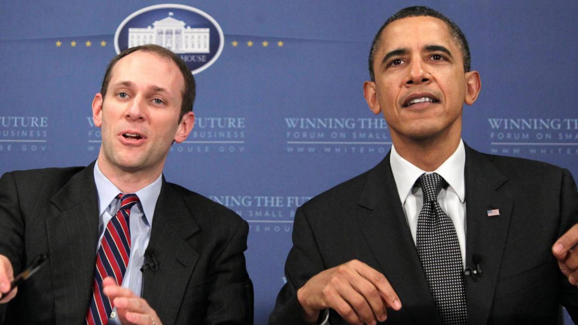 President Barack Obama and Council of Economic Advisers Chairman Austan Goolsbee, participate in an online chat session during the Winning the Future Forum on Small Business at Cleveland State University in Cleveland, Tuesday, Feb. 22, 2011. (AP Photo/Carolyn Kaster)