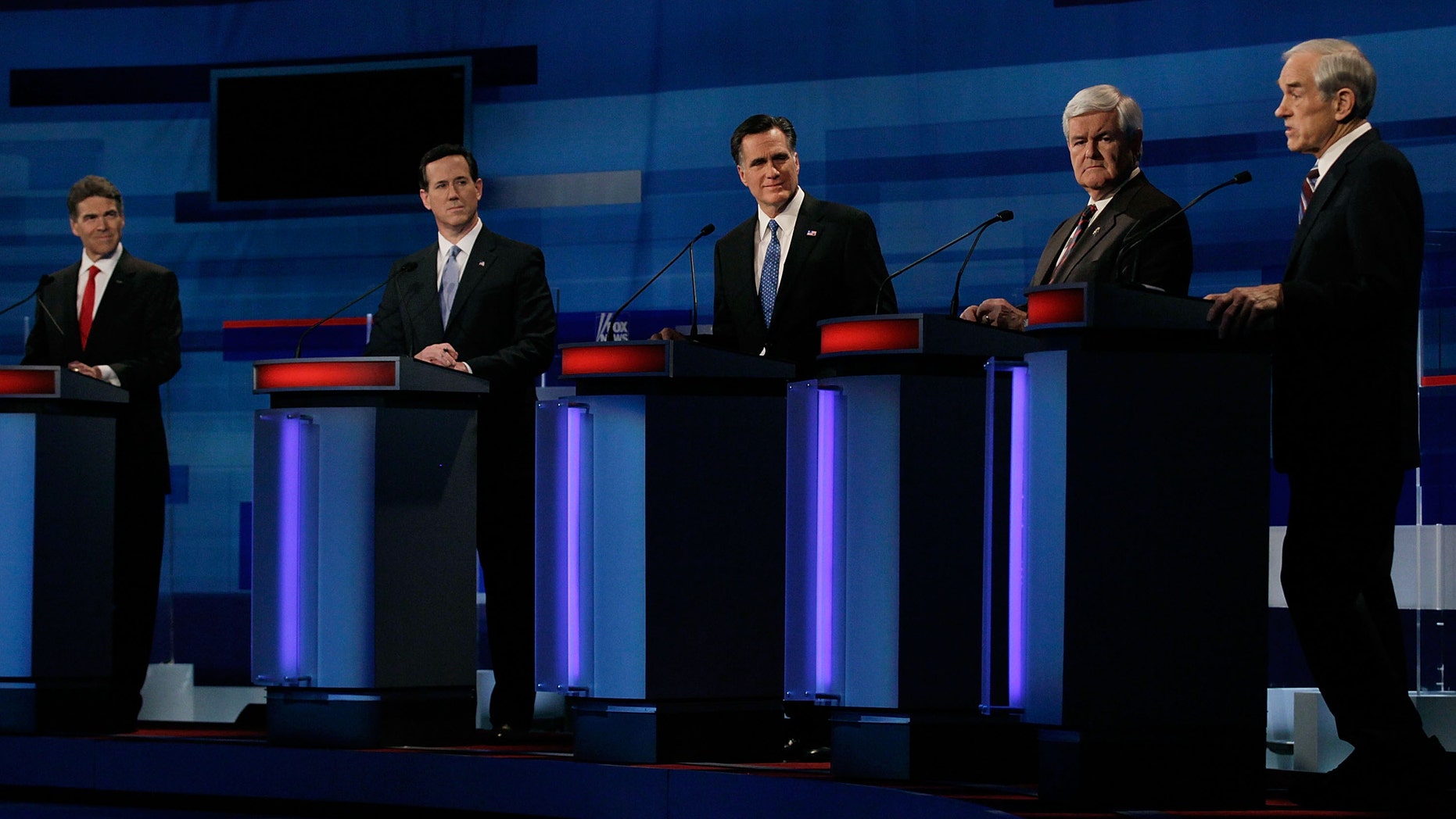 MYRTLE BEACH, SC - JANUARY 16: Republican presidential candidates (L-R) Texas Gov. Rick Perry, former U.S. Sen. Rick Santorum (R-PA), former Massachusetts Gov. Mitt Romney, former U.S. House Speaker Newt Gingrich (R-GA) and U.S. Rep. Ron Paul (R-TX) participate in a Fox News, Wall Street Journal-sponsored debate at the Myrtle Beach Convention Center, on January 16, 2012 in Myrtle Beach, South Carolina. Voters in South Carolina will head to the polls on January 21st. to vote in the Republican primary election to pick their choice for U.S. presidential candidate. (Photo by Joe Raedle/Getty Images)