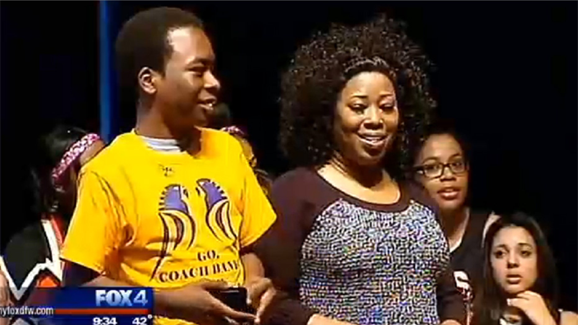 Banks Graham, 16, and his mother Edna listen to a special message from Kobe Bryant.