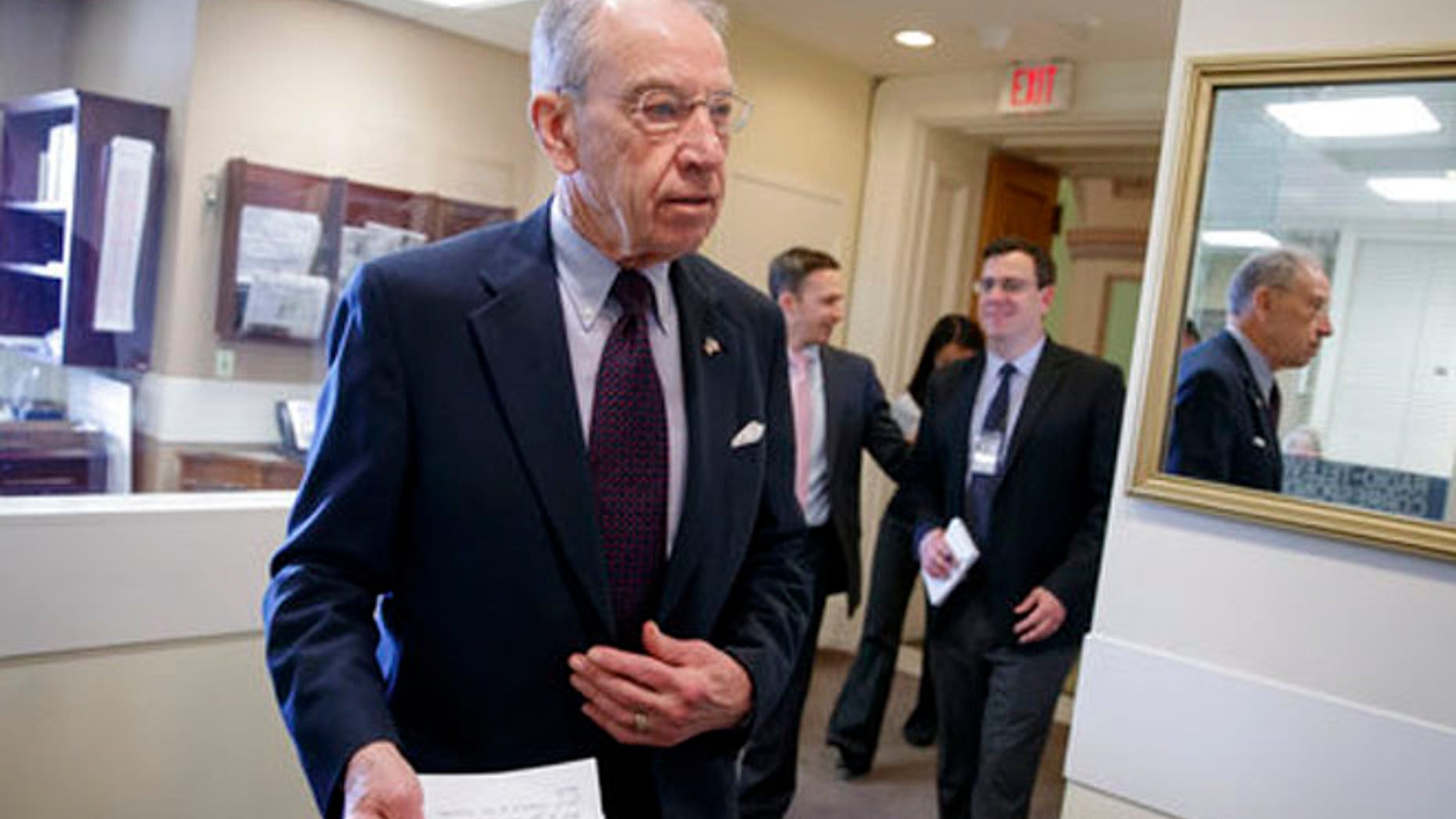 Senate Judiciary Committee Chairman Chuck Grassley, R-Iowa, arrives for a news conference just after the confirmation vote for President Donald Trump's high court nominee, Neil Gorsuch, on Capitol Hill in Washington, Friday, April 7, 2017. (AP Photo/J. Scott Applewhite)