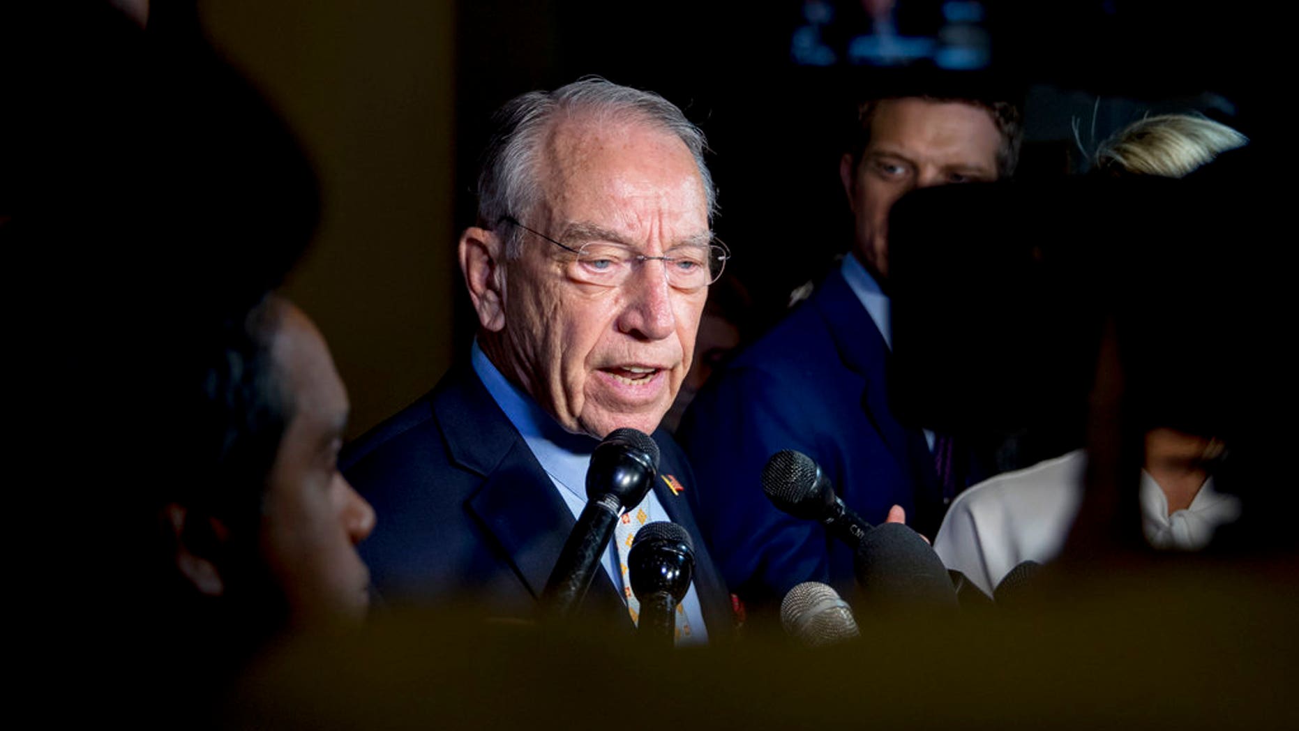 Senate Judiciary Committee Chairman Chuck Grassley, R-Iowa, speaks to reporters on Capitol Hill, Wednesday, Sept. 19, 2018, in Washington. Christine Blasey Ford wants the FBI to investigate her allegation that she was sexually assaulted by Supreme Court nominee Brett Kavanaugh before she testifies at a Senate Judiciary Committee hearing next week. (AP Photo/Andrew Harnik)