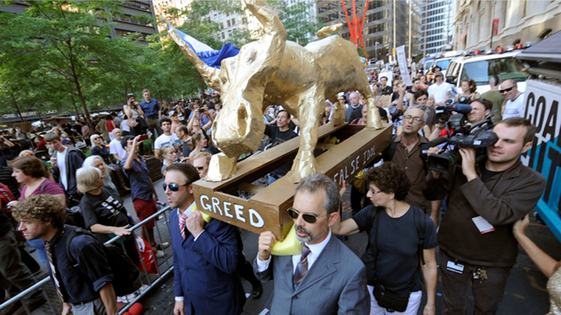 Oct. 9: A coalition of clergy carry a 'False Idol' to the Occupy Wall Street encampment in Zuccotti Park in New York.