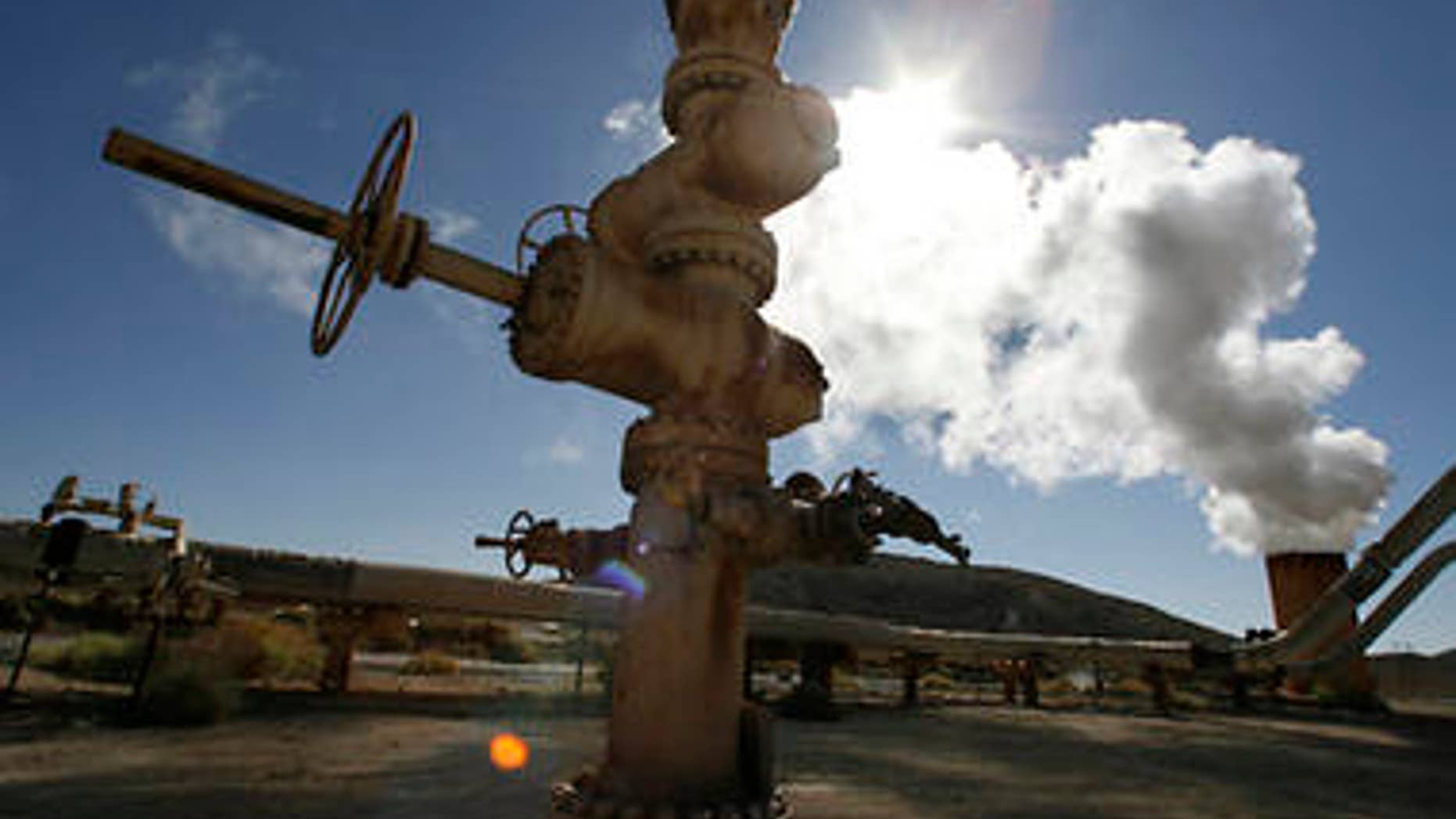 Steam rises during a test from a well at the Coso geothermal field at the China Lake Naval Air Weapons Station in China Lake, California in this July 31, 2008 file photo. California set detailed goals to cut greenhouse gases and address global warming on December 11, 2008 in the face of strong criticism that an economic analysis buttressing the plan was hopelessly optimistic. REUTERS/Fred Prouser/Files (UNITED STATES)