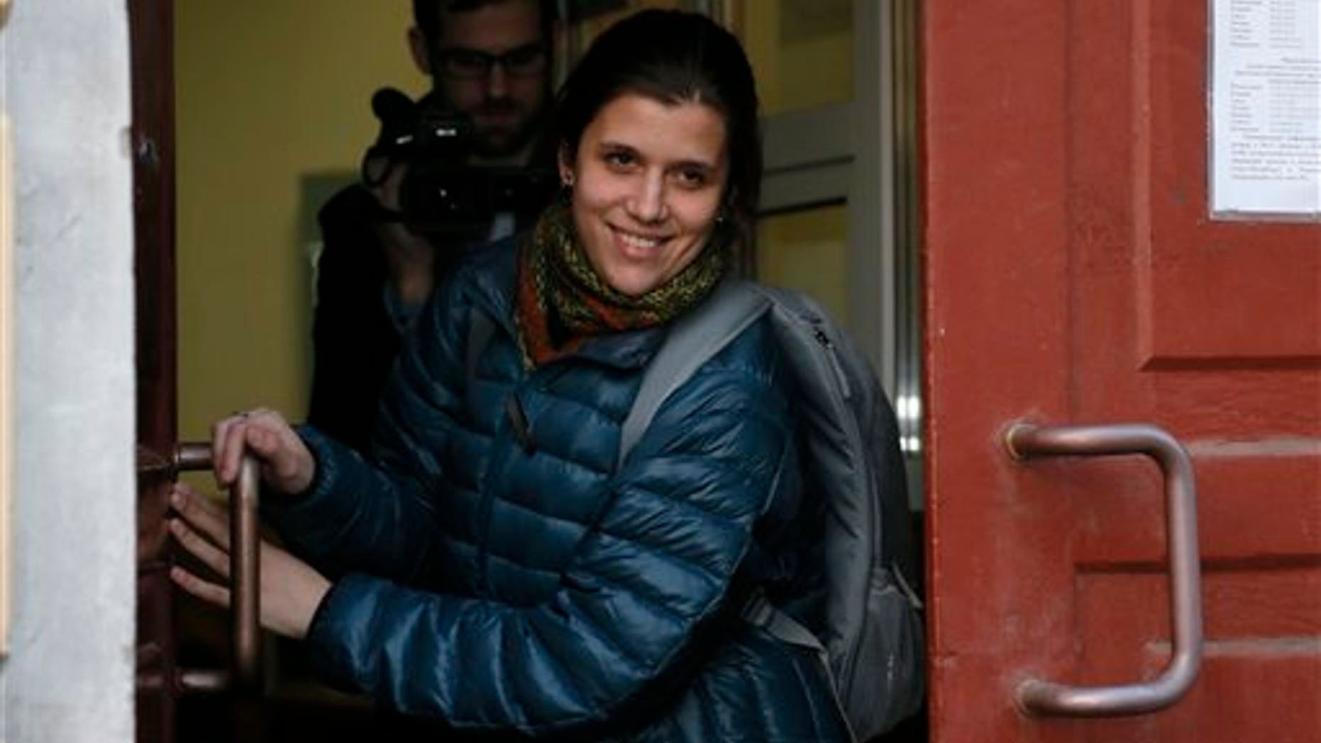 Camila Speziale exits the Federal Migration Service in St. Petersburg, Russia, on Dec. 25, 2013.