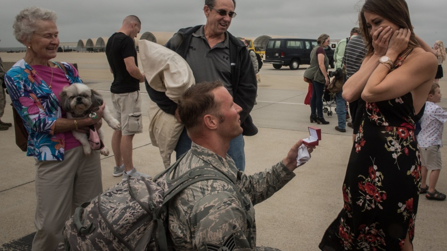 Virginia Air National Guard Staff Sgt. Jeff Greenquist (left) returned from a six-month deployment to the Middle East and asked girlfriend, Ashley Branham, to marry him. (U.S. Air Force photo by Staff Sgt. Carlin Leslie)