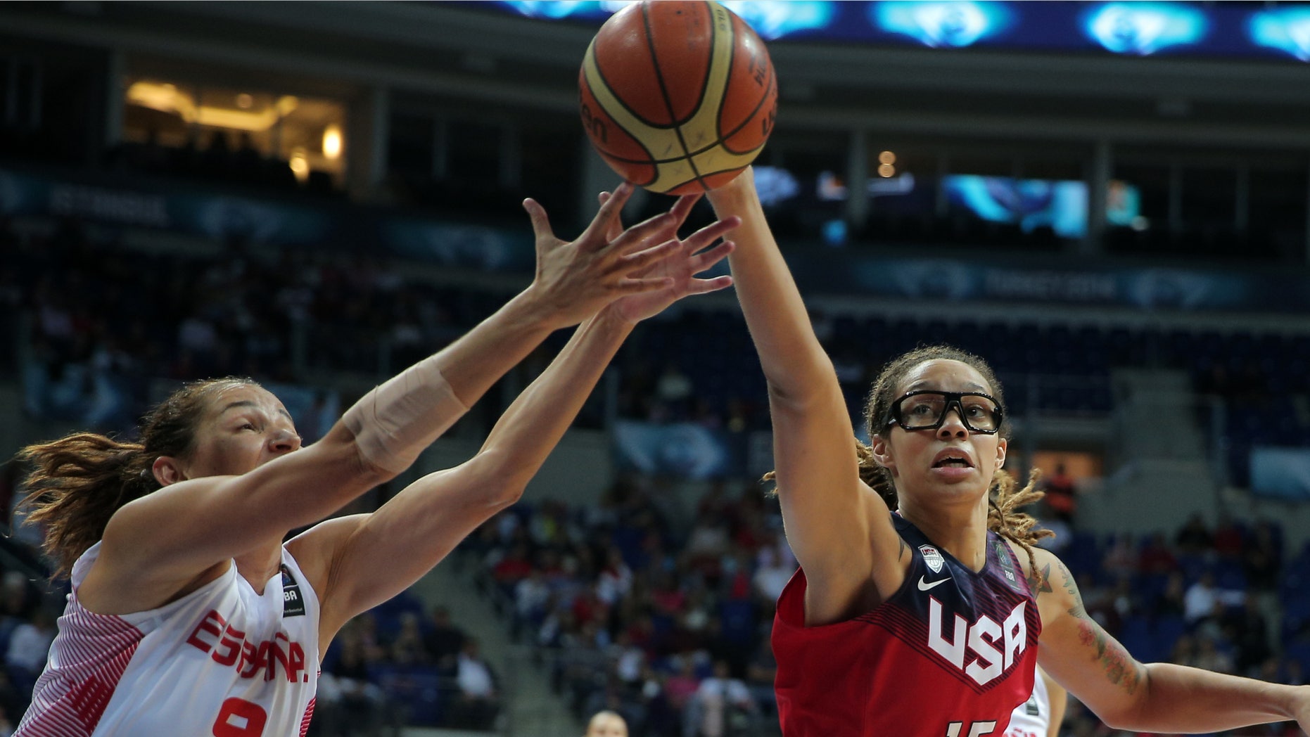 Oct. 5, 2014: Laia Palau, left, of Spain, and Brittney Griner of the US, fight for the ball during the Basketball World Championship for Women's final
