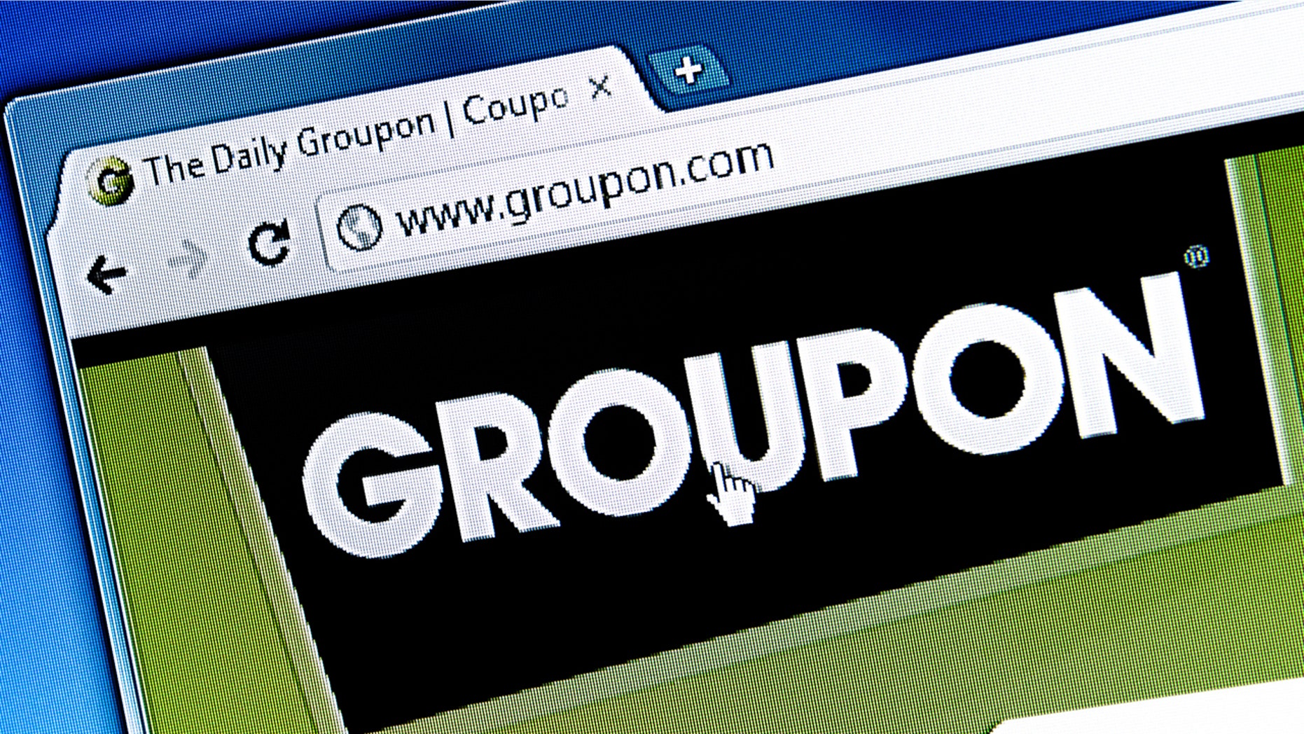 Groupon has apologized after ads with racial slurs appeared on the site.