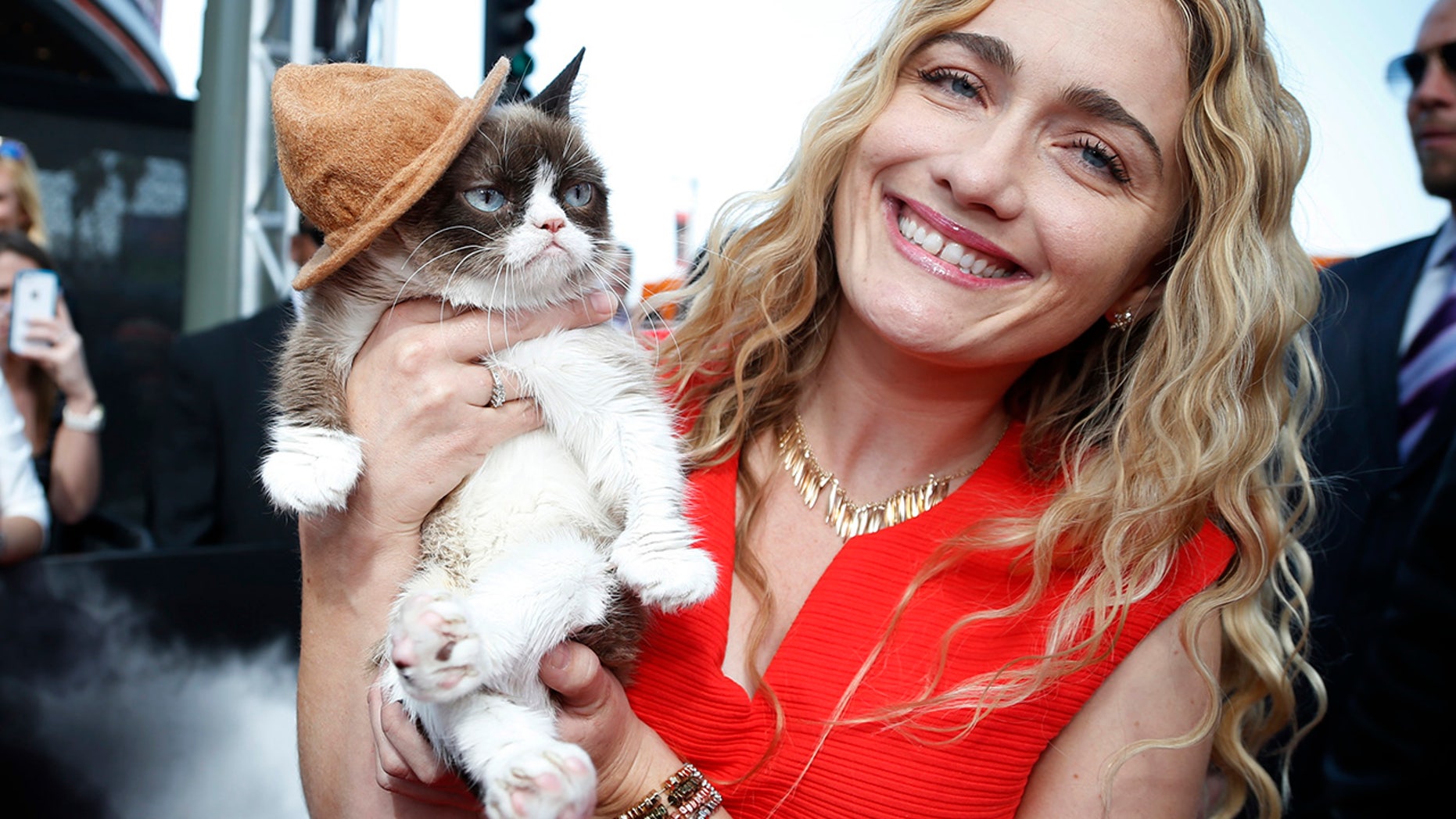Grumpy Cat and his owners won a legal battle against a beverage company they claim engaged in "despicable misconduct."