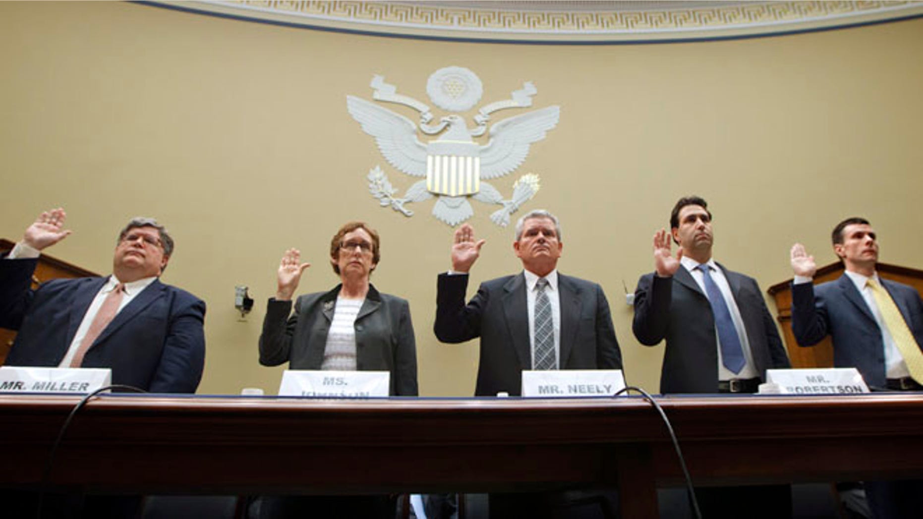 April 16, 2012: Witnesses prepare to testify on Capitol Hill about GSA spending. The former agency commissioner Jeff Neely is third from the left.