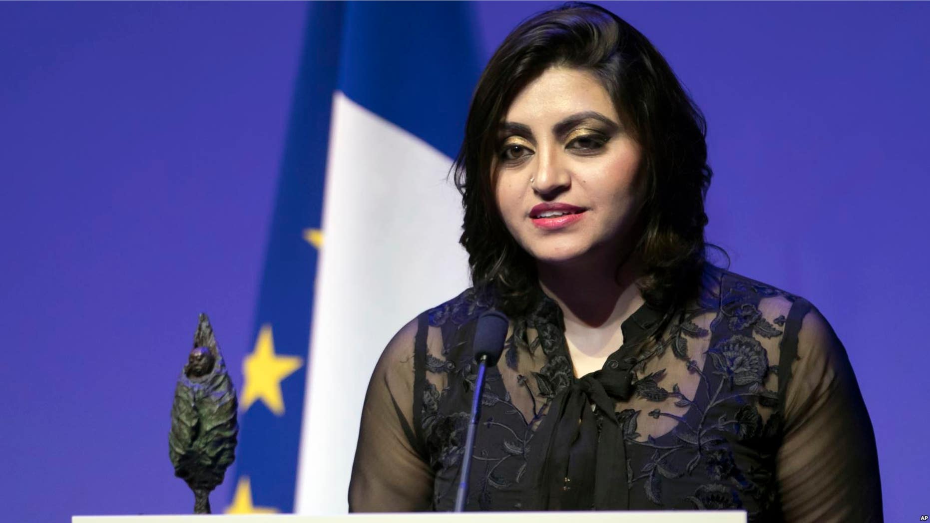 Pakistan's Gulalai Ismail delivers an acceptance speech after being awarded the Prize for Conflict Prevention for the work of her organization 'Aware Girls' promoting women's issues and equality in Pakistan at the Musee Branly in Paris, France, November 24, 2016.
