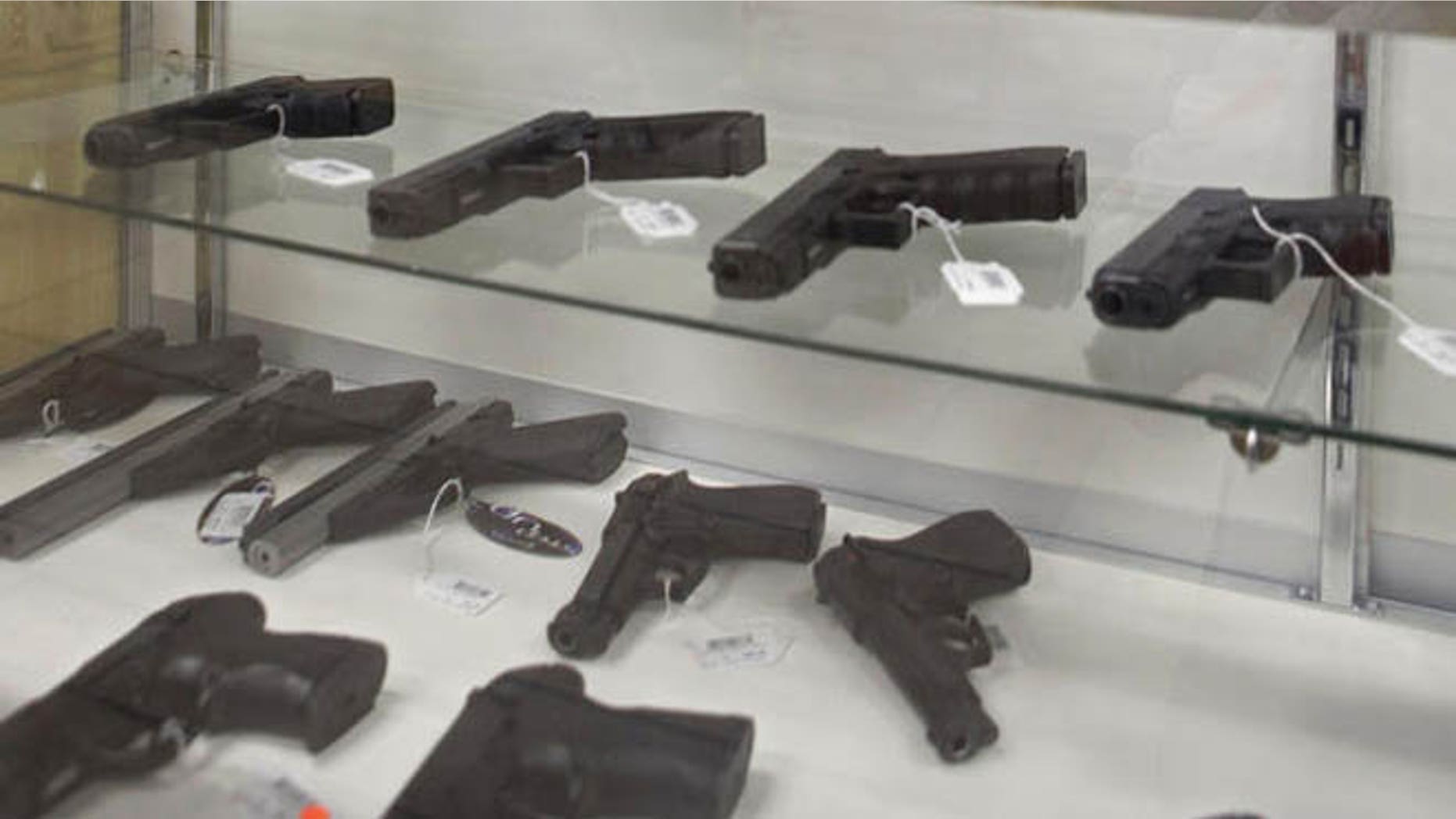 Jan. 16, 2013: Firearms are shown for sale at a store in Middlefield, Ohio.