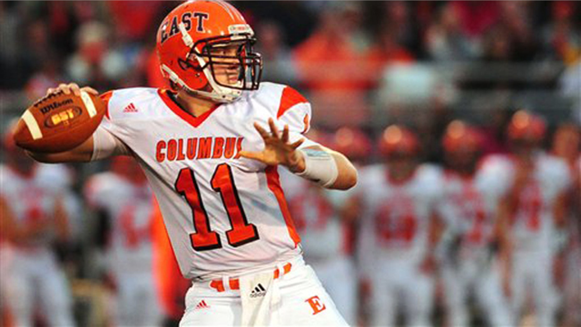 Sept. 9, 2011: This photo shows Columbus East quarterback Gunner Kiel dropping back to pass in the second quarter of a highs chool football game against Jennings County in North Vernon, Ind.