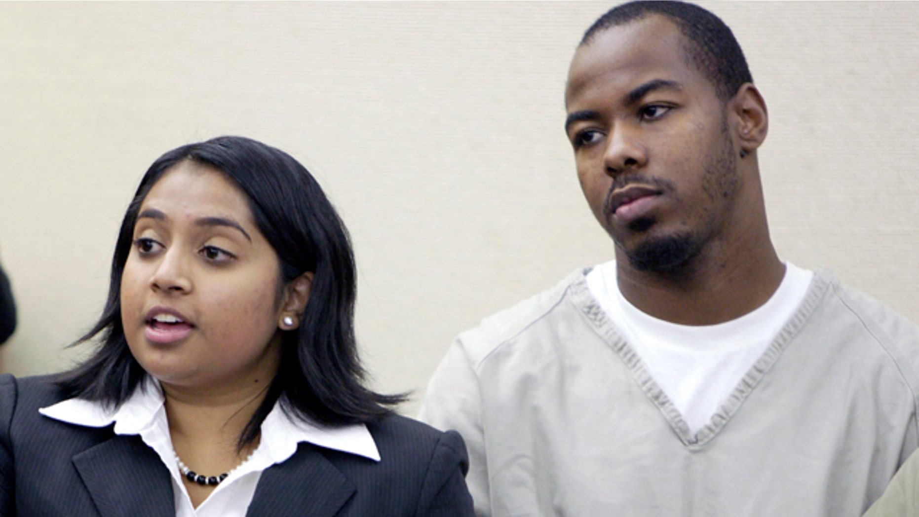 Oct. 20: Dominic L. Holt-Reid, right, listens as his attorney Priya Tamilarasan talks to the judge during his arraignment hearing in Franklin County Common Pleas Court in Columbus, Ohio. Reid accused of pointing a handgun at his pregnant girlfriend and forcing her to drive to an abortion clinic has been charged with attempted murder under an Ohio law prohibiting the unlawful termination of a pregnancy, a prosecutor said Wednesday. (AP)