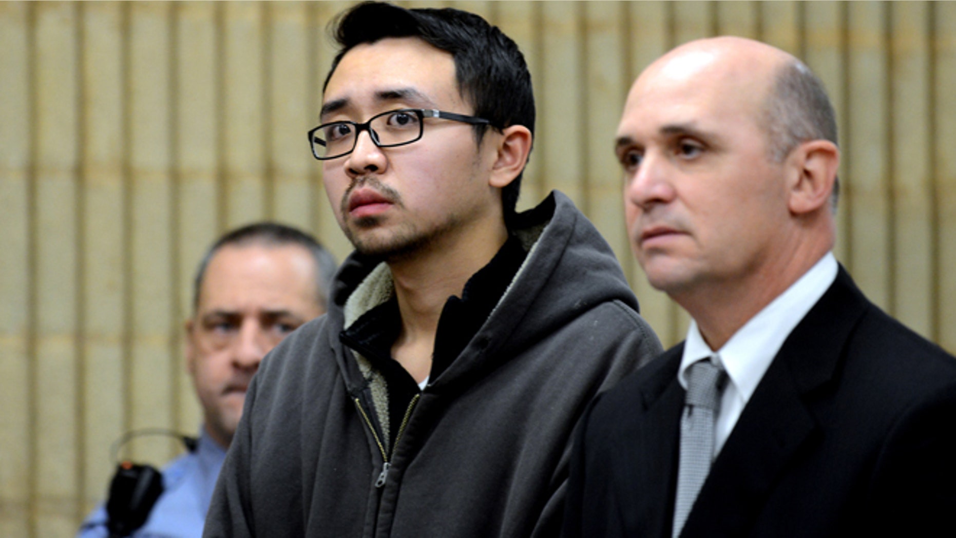 Dec. 4, 2013: University of New Haven student William Dong, 22, of Fairfield, Conn., with assistant public defender Kevin Williams, right, appears during his arraignment.