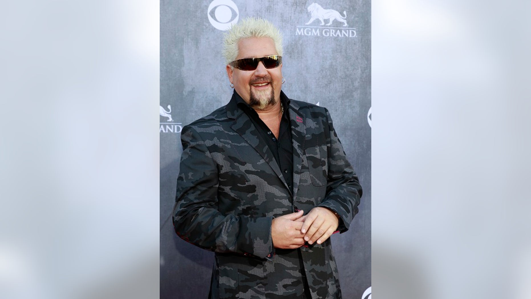 Celebrity chef Guy Fieri teamed up with the Salvation Army to cook barbecue for those who evacuated the ravaging wildfires in California.