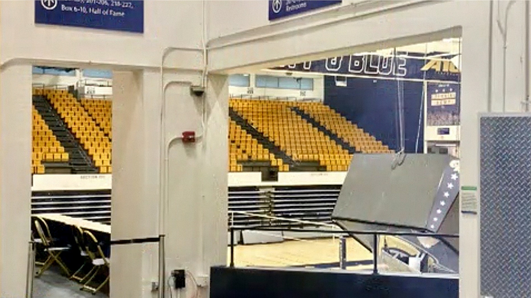 George Washington University scoreboard crashes onto basketball court George Washington University scoreboard crashes onto basketball court
