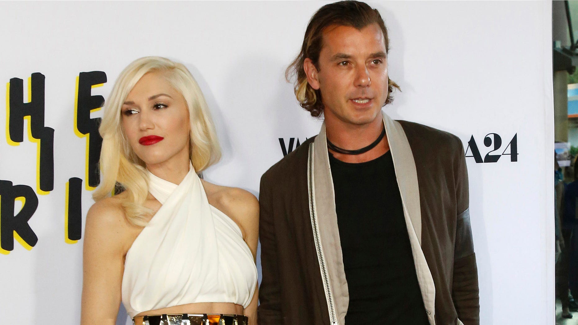 June 4, 2013. Gavin Rossdale and his wife Gwen Stefani pose at the premiere of "The Bling Ring" in Los Angeles.