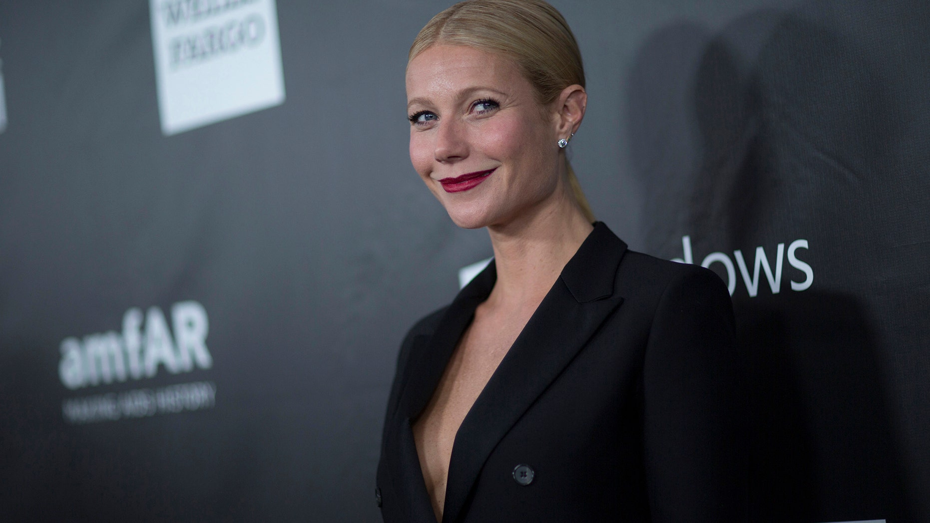 Actress Gwyneth Paltrow poses at the amfAR's fifth annual Inspiration Gala in Los Angeles, California October 29, 2014.