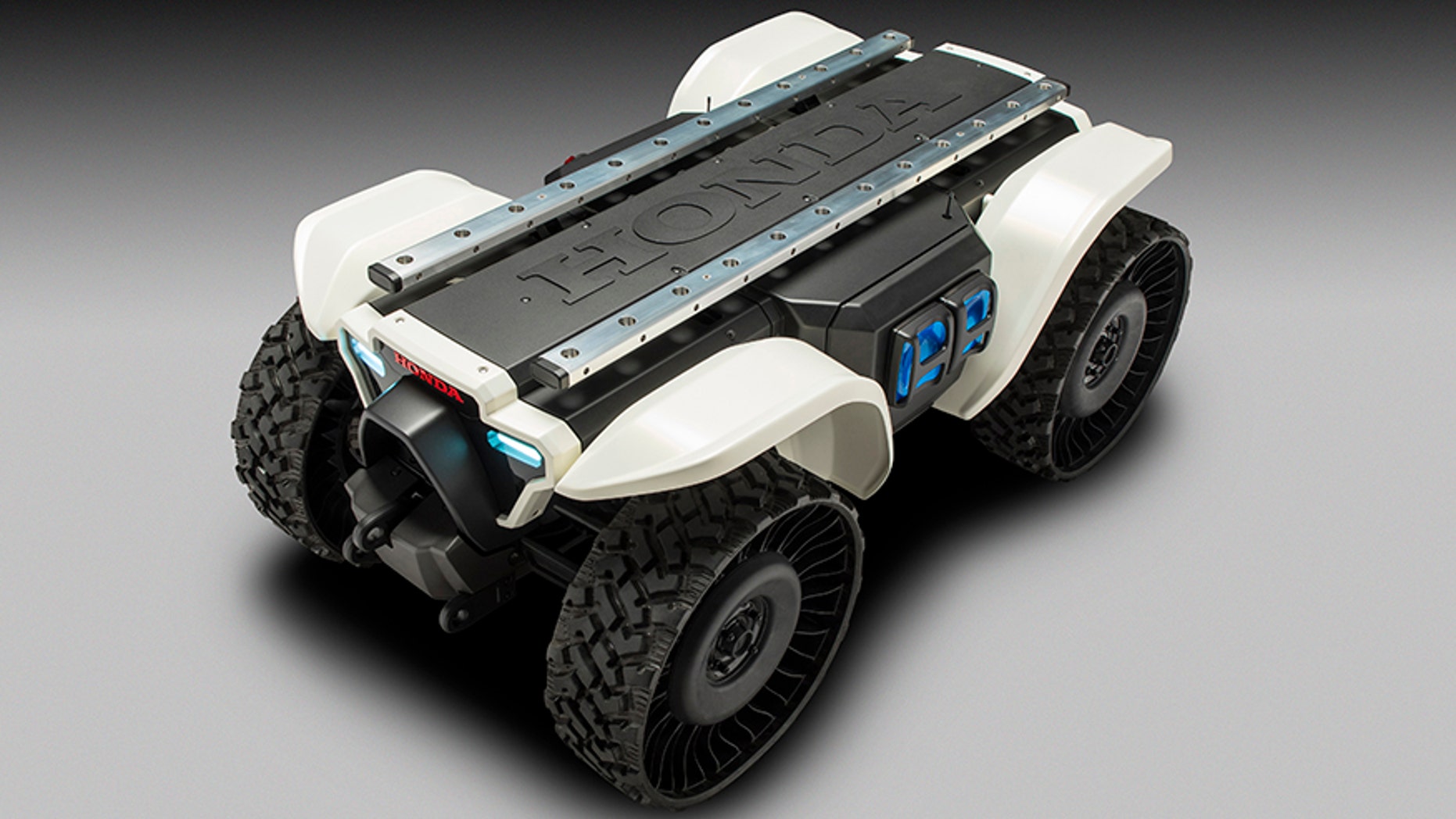 Hondaâs 3E-D18 accommodates multiple attachments for different situations.