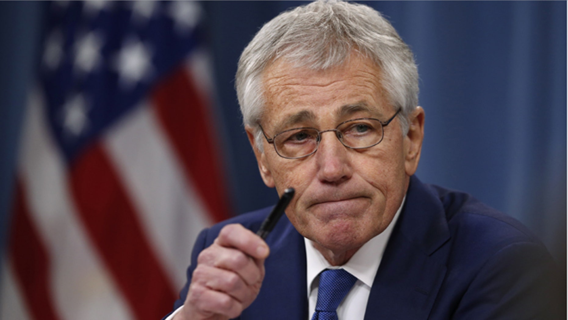 Dec. 19, 2013: Defense Secretary Chuck Hagel takes questions as he briefs reporters at the Pentagon in Washington.