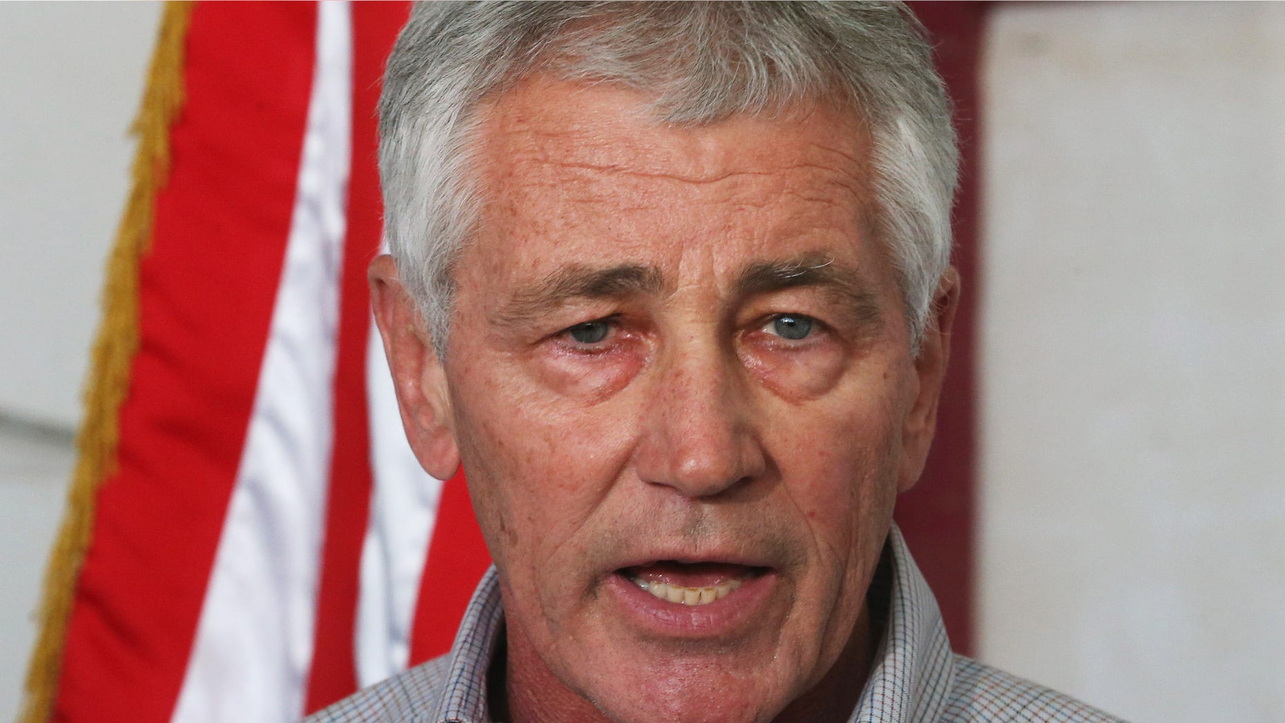 Dec. 8, 2014: U.S. Secretary of Defense Chuck Hagel speaks during a press conference after visiting U.S. troops in Kuwait City.