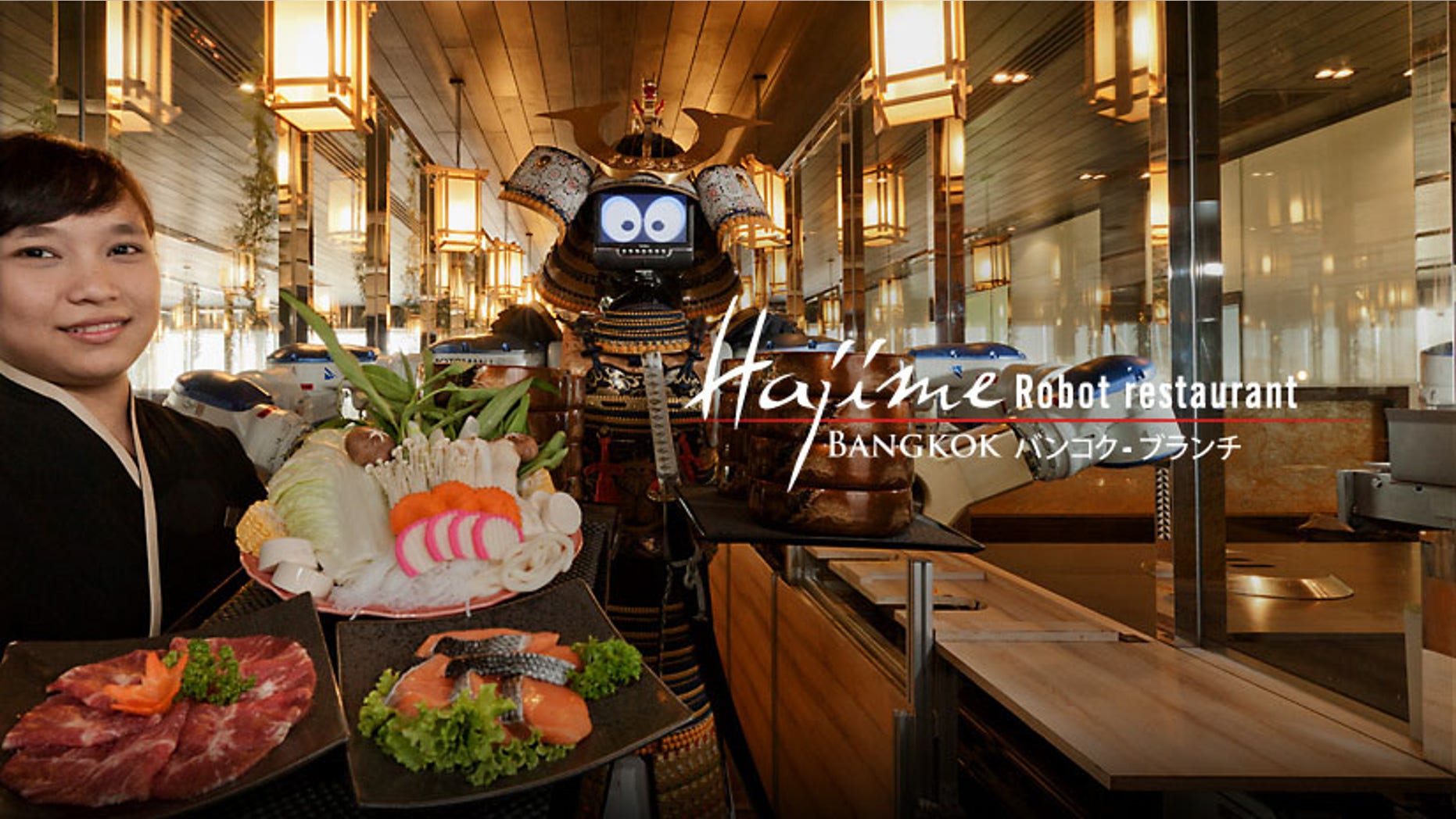 Hajime Robot Restaurant in Bangkok employs robots as their waitstaff. Diners sit facing a glass enclosure where the robots move back and forth on a track and serve customers through windows.